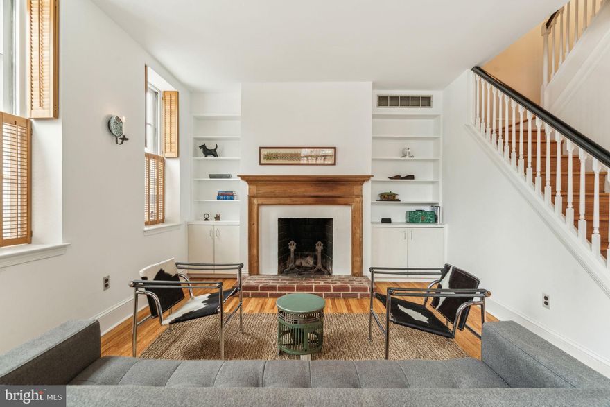 Charming, bright corner 4 bed/2 bath home in Old City.  The ground floor features oak floors, living room with wood burning fireplace and built-in cabinetry as well as a large kitchen and access to a bricked patio perfect for small parties. The upper floors have gorgeous pumpkin pine floors.  The 2nd and 3rd floors each have 2 bedrooms and a tile hall bath. 3 of the bedrooms have wood burning fireplaces.  Bonus 4th floor open loft.  Full unfinished basement for storage and mechanicals. This special home is tucked into a quiet corner of Old City walking distance to all this great neighborhood has to offer. Radicchio. Cafe Ole.  Franklin Fountain. Old City Coffee. Located within the McCall school Catchment. Easy access to 95, 676, Market Street line.