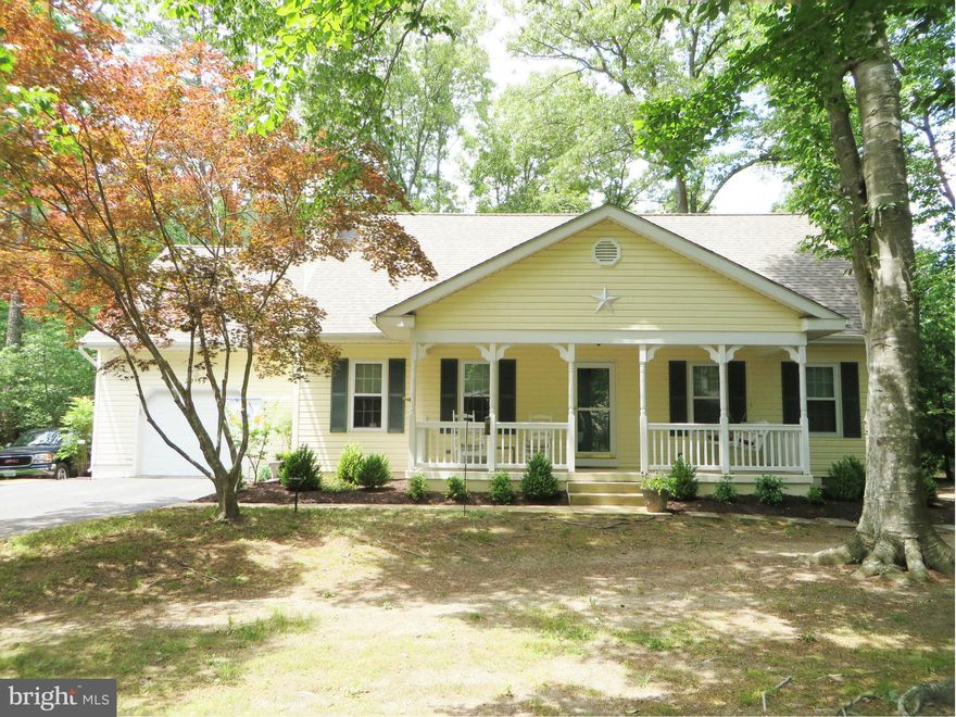 Delightful Cape Cod with vaulted ceiling living room & first-floor MBR will steal your heart! Updates & improvements inc kitchen appl's, flooring, bath fixtures, gas FP insert, custom blinds, roof & gutters, sunroom windows, A/C compressor, landscaping, patio! MBR w/2 WICs, bath w/jetted tub, dbl sinks. 2nd BR w/sitting alcove; 3rd BR w/walk-in attic storage. Front porch, garage, cul-de-sac lot!