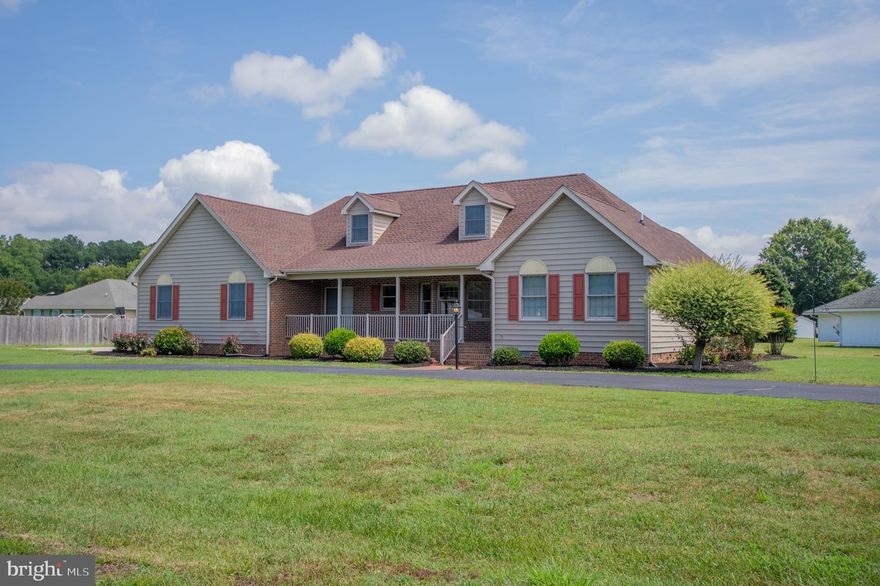 Welcome to this charming 3-bedroom, 2-bathroom home in Princess Anne, MD, offering beautiful water views of the Manokin River. Situated on a spacious corner lot, this home features a large covered front porch perfect for relaxing and enjoying the scenery. Inside, you'll find a spacious living room, formal dining area, and a kitchen with ample cabinetry and a stainless steel refrigerator. The generously sized primary suite includes a soaking tub, stand-up shower, and plenty of space to unwind. Two additional bedrooms share a full hall bath. Enjoy year-round natural light in the cozy sunroom off the back of the home. Additional highlights include a 2-car attached garage, a large walk-up attic, and a detached 1-car garage—ideal for storage or hobbies. Benefit from town water and sewer, plus a separate well for irrigation. A 2.5-year-old roof with warranty and a blacktop driveway complete this exceptional property. Don’t miss this unique opportunity with river views!