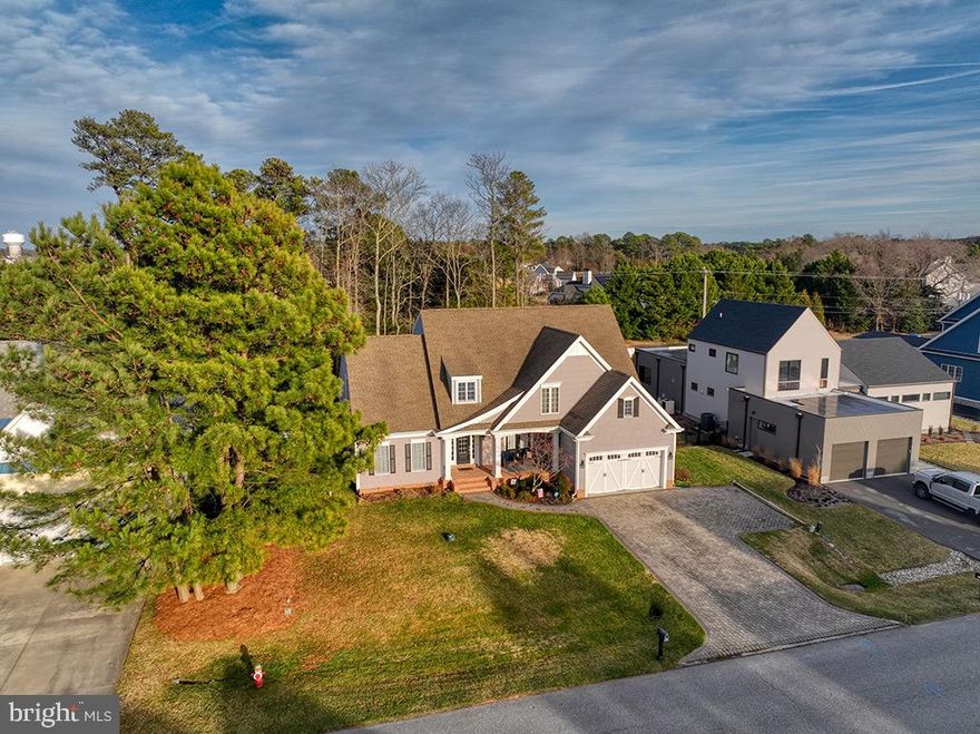 Located in Rehoboth Beach, Delaware, in the highly desirable Rehoboth Beach Yacht and Country Club (also known locally as RBYCC), this 5-bedroom, 4.5-bath custom home offers over 3,800 square feet in one of the most sought-after golf course communities in Sussex County, DE. 

Just minutes from downtown Rehoboth Beach, the Rehoboth Beach Boardwalk, Atlantic Ocean beaches, Route 1 shopping corridor, and coastal dining, this home is ideal for buyers searching for: 

Homes for sale in Rehoboth Beach Delaware 
Golf course homes in Sussex County DE 
Luxury homes near the Delaware Beaches 
Second homes in Rehoboth Beach 
Coastal retirement homes in Delaware 

Built in 2006 by McGregor Custom Homes, this residence blends timeless coastal architecture with thoughtful upgrades. 

Inside, the dramatic two-story great room features hardwood flooring and a gas fireplace, creating a bright, open gathering space ideal for entertaining. The gourmet kitchen includes granite countertops, gas cooktop, double wall ovens, hardwood floors, and brand-new stainless refrigerator, dishwasher, and microwave. 

The first-floor primary suite offers tray ceilings, hardwood flooring, ceiling fan, spa-style bath with soaking tub, tile shower, double vanity, and large walk-in closet — ideal for main-level living in Rehoboth Beach. 
Upstairs, multiple ensuite bedrooms provide privacy for guests or multigenerational living, including two more private suites, a walk in storage room or hobby room, one more bedroom and a hall bathroom and lots of light and space for your family and friends. 

One of the key features of this fabulous design is the outdoor living spaces starting with the large covered front porch – a space many buyers are asking for and many homes no longer have them. What a bonus! In the back of the home the kitchen and great room lead to the 13x14 screened porch and then an expansive low maintenance style deck plus two additional backyard decks (one with electric for a hot tub), newer vinyl fenced in backyard, plus a deep space behind the fence with mature trees for privacy and an irrigation system with private well to save you thousands on water bills.  

A few final bonuses to this home design include that the second-floor HVAC was replaced approx. 4 years ago, the laundry room with granite counters, sink, cabinetry, hanging space and  newer washer/dryer is the mud room of your dreams and easy, clean access to the crawl space entry door is located in the garage. This home was smartly designed and has been lovingly updated and maintained.  

For buyers relocating to Delaware, searching for a primary residence near the beach, or investing in a luxury home in Rehoboth Beach Yacht & Country Club, this property offers space, flexibility, and prime location in the heart of the Delaware Beaches.