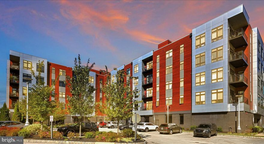 Welcome to the epitome of luxury living at 575 South Complex in the heart of King of Prussia Town Center! This exquisite 1,346-square-foot condominium is a perfect blend of elegance, functionality, and modern convenience. Step inside to discover an open and inviting social area that seamlessly combines a modern Kitchen with top-tier finishes, a spacious Dining Area, and a comfortable Living Room. Whether entertaining guests or enjoying a quiet evening, the space flows effortlessly to a private balcony, offering serene views of the sky and not just another building. This condo is designed with your comfort in mind, featuring a luxurious Owners Suite with a Walk-In Closet and Full Bath, and an additional generously-sized Bedroom with a nearby Hall Bath. Both rooms are spacious enough to accommodate any furniture style comfortably, making it easy to create your personal retreat. The upgraded Owners Suite  Closet is both practical and stylish. Everyday chores are simplified with a dedicated laundry area right within the unit. Two assigned parking spaces—one in the garage and one in the parking lot—add to the ease of living. Additionally, a storage cage provides extra space for your belongings. Beyond the walls of your home, enjoy unparalleled amenities that cater to work, relaxation, and entertainment. The rooftop deck offers panoramic views of Valley Forge National Park, where you can bask in stunning sunsets or host gatherings in a breathtaking setting. Indoors, you'll find cozy lounges, tranquil workspaces, and a billiards area to suit every mood. The Coffee Bar, complete with a Starbucks Coffee Bar and Beverage Refrigerator, adds a touch of sophistication to your daily routine. Maintain your active lifestyle in the state-of-the-art Gym, equipped with Peloton and Life Fitness machines, or perfect your swing in the Golf Simulator Room. Movie lovers will adore the private theatre room, bringing the cinematic experience right to your building. The indoor and outdoor entertaining spaces, connected by louvered doors, provide versatility and a picturesque backdrop of the water—perfect for hosting tailgates, family gatherings, or casual evenings with friends. Convenience is at the forefront of life at 575 South. The Luxe mailroom includes a Large Refrigerator for special deliveries, while the security desk and remote entry system ensure a warm welcome and peace of mind. The location is a commuter's dream, with easy access to major highways including 202, 422, 78, and 276. When it’s time to relax, the King of Prussia Mall, a variety of shops, and numerous eateries are just seconds away. Outdoor enthusiasts will appreciate the proximity to Valley Forge National Park, ideal for walks or outdoor lunches. Nearby amenities such as Top Golf, Lifetime Gym, and IMAX Cinema offer endless entertainment options. The community itself is thoughtfully managed, with an active board that prioritizes homeowners' interests without being intrusive. Say goodbye to the hassles of lawn care and snow removal and embrace the freedom of low-maintenance living. 575 South Building offers the ultimate combination of luxurious design, practical amenities, and an unbeatable location. Don’t miss the chance to call this exceptional property your home!