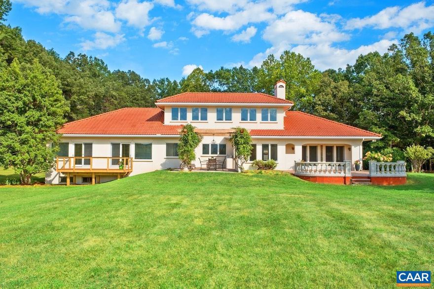 Open House Sept 14 1-4pm. Mediterranean inspired and designed with amazing mountain views and privacy! The approach to the home is magnificent, but the views upon arrival will take your breath away. Be mesmerized by the sweeping pastoral and mountain views from inside with large windows to frame the view and from outdoors - arbor covered courtyard with water feature, patio, deck, or pool and small pool house with mini kitchen. Comprised of nearly 100 acres with an estimated 30+ acres of pasture and balance in woods and creeks for hiking or exploring AND includes 2 extra parcels if family wants to build nearby. The architectural design and Smith and Robertson custom construction brought the owner's vision to life with custom details in porches, arches, lighting, and handcrafted tiles. Features: vaulted ceilings, sky lights, hardwood floors, wood trim and doors, wood stove insert, fiber optic internet, spacious rooms and many extra living spaces such as home office, den, upstairs guest suite or apartment with mini kitchen, and a basement offering space for recreation, exercise, guests, or storage. Coveted Afton location only 1.5 miles to Rt 151 and the wine and brew trail, 10 min to Nellysford town hub, and 30 min to Charlottesville,Tile Counter,White Cabinets,Fireplace in Living Room