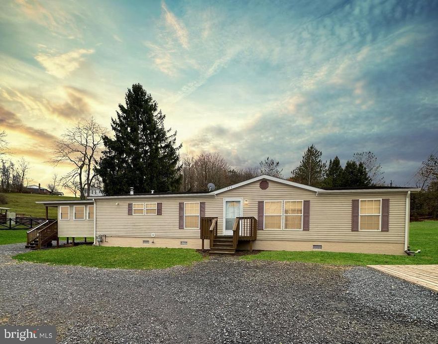 *BRAND NEW METAL ROOF* 
Step into your dream ranch home built in 2008, just outside of Philipsburg. Nestled on over half an acre, this 1,760+ sq ft residence offers a seamless blend of modern comfort and charming design. The large living area is bathed in natural light, creating a warm and inviting ambiance throughout. Enjoy the open concept layout that effortlessly connects the living, dining, and kitchen areas, featuring an abundance of cabinet and counter space.
The home includes a convenient pantry with a crawlspace access door, a separate laundry area, and an office/bonus room. The owner’s suite is a true retreat, boasting a large bathroom with a jacuzzi tub, shower, double sink, fireplace, linen storage, and a separate toiletry room. Two additional bedrooms offer ample storage space, accompanied by a secondary full bathroom.
Outside, the wrap-around driveway ensures safety and ease of access. The property is enhanced by two pre-fabricated garages, one newly installed by Nittany Structures and equipped with electricity. Served by natural gas, public water and sewer, and central AC, this home combines practicality with comfort in a picturesque setting. Come and make this exceptional property your own!