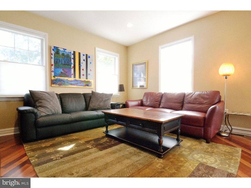 Enjoy the good life in this stunning 3 bedroom, 2.5 bath, corner Graduate Hospital home, with off-street PARKING, copper-clad bay windows, outdoor space, and a finished basement.