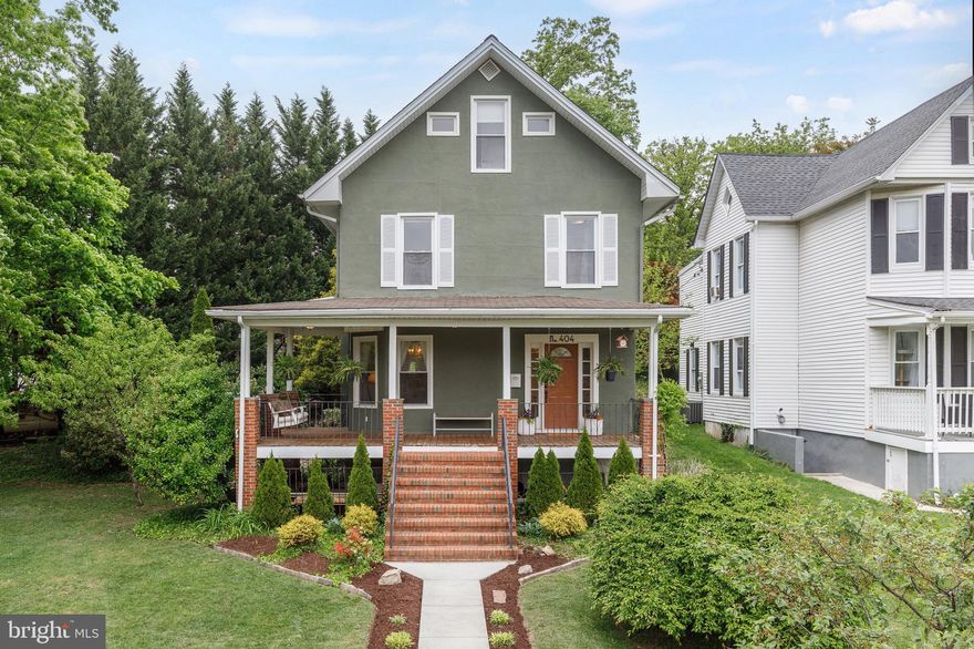 Welcome to 404 Evesham Avenue, a beautifully maintained and character-filled home ideally situated in a quiet neighborhood within the sought-after Roland Park school district. This prime location offers the best of both convenience and community—just moments from Belvedere Square Market, The Senator Theatre, local universities, Towson, downtown Baltimore, and major commuter routes.

Step inside to a warm and inviting main level where timeless charm meets thoughtful design. Rich hardwood floors run throughout, complemented by abundant natural light pouring in through large windows. The front living room makes an immediate impression with a beautifully wallpapered accent wall along the staircase, adding depth and character, while a built-in display shelf offers the perfect place to showcase décor or personal touches. This space feels both stylish and welcoming—ideal for everyday living or entertaining. Just beyond, the formal dining room is drenched in sunlight from expansive windows and finished with a classic chandelier that creates an elegant setting for gatherings.

The gourmet kitchen is a true standout, blending charm with modern updates. Featuring hardwood flooring, distinctive teal cabinetry—including glass-front cabinets with display shelving—this space feels both curated and inviting. Quartz countertops pair seamlessly with a bright white subway tile backsplash, while stainless steel appliances add a sleek, updated touch. Two passthrough windows enhance the flow and openness, making the kitchen feel connected and functional.

Just off the kitchen, a cozy den provides the perfect space to unwind or gather with guests. A convenient half bath completes the main level.

Upstairs, the second level offers three spacious bedrooms and a full bathroom. The primary bedroom is filled with natural light and offers a comfortable, peaceful retreat with plenty of room to relax. The top level features a versatile loft with a full bathroom—ideal for a guest suite, home office, or additional living space.

The lower level offers additional flexibility with ample room for entertaining, a half bath, and a unique bonus area previously used as a hair salon—perfect for a home business, studio, or creative workspace.

Step outside to your own private backyard oasis. Surrounded by mature greenery, the outdoor space features a charming covered porch ideal for relaxing or entertaining. String lighting, cozy seating areas, and thoughtfully designed landscaping create a peaceful, tucked-away retreat that feels like an extension of the home.

With its blend of character, functionality, and unbeatable location, 405 Evesham Avenue is a truly special opportunity to call home.