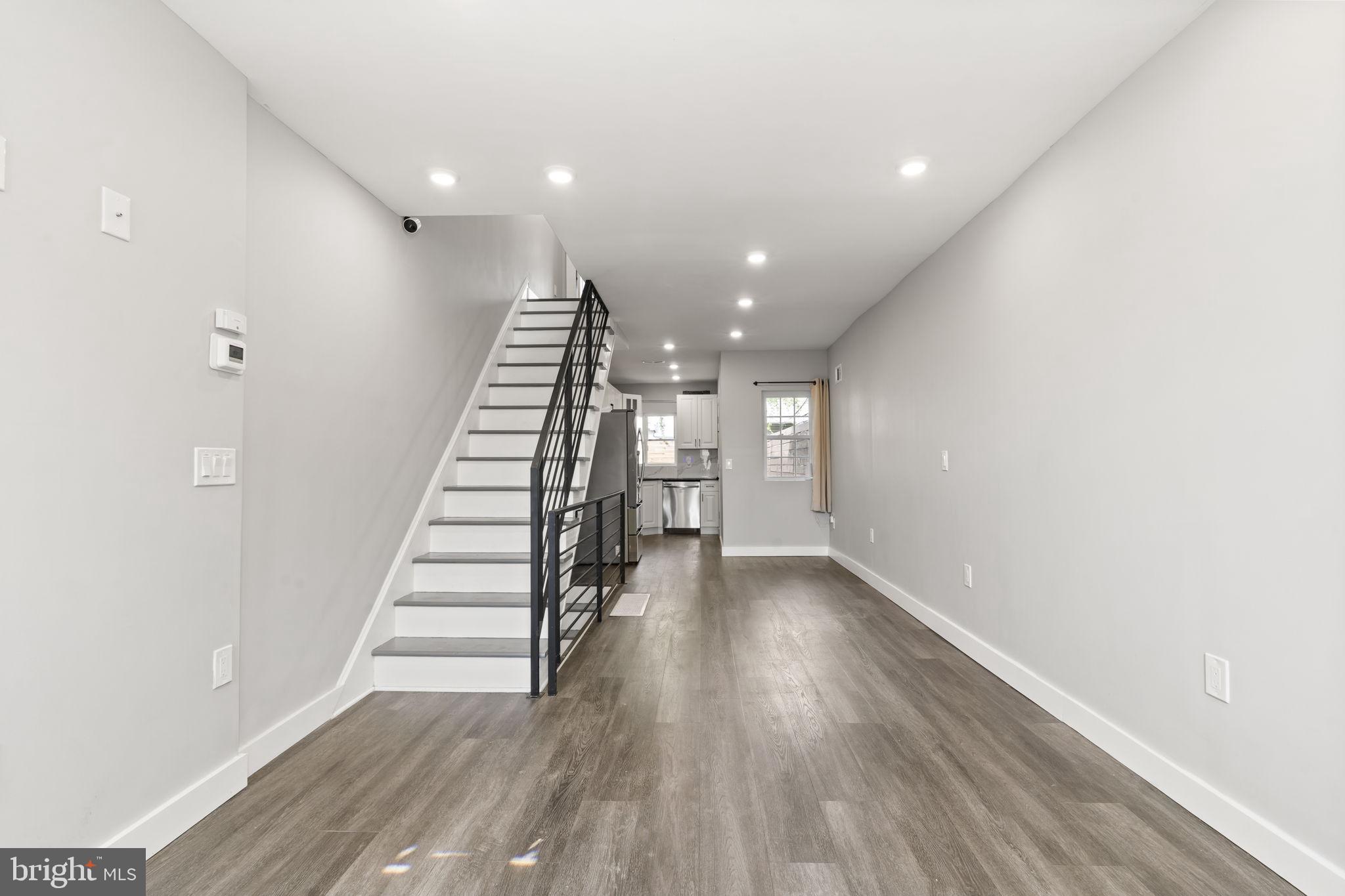 Looking for a modern rental in East Kensington? This updated home is packed with style and convenience!
Inside, you’ll find an open layout with sleek hardwood floors and a stunning kitchen featuring quartz countertops, custom cabinets, and stainless steel appliances. The fenced patio is perfect for enjoying fresh air, urban gardening or hosting a casual hangout.
Upstairs offers two spacious bedrooms and two full bathrooms, including an en suite for added comfort. Natural light fills the space, giving every room a bright, welcoming feel.
Need extra room? The finished lower level gives you options—set it up as a media area, home office, or workout space, with plenty of storage to keep things organized.
You’ll be close to great dining, coffee spots, and quick transit options to Center City.
This home is available now—don’t miss out!