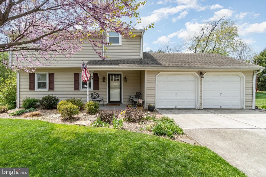 Smartly updated traditional with not so traditional features. Top to bottom Kitchen redo w/  pub height peninsula bar, slate tile backsplash, black SS appliances, generously sized spice cabinet, and slider to elevated deck w/ commanding view of back yard. French doors connecting foyer and LR and all 2nd level BR's. Stained solid pine doors on 1st and 2nd floor. Remodeled main bath with tiled walls, granite top double bowl vanity and tiled floor. Finished, exposed lower level w/ game room, 4th BR and full bath. Game room has gas logs, neutral carpet and a walk out to backyard. The heated, salt water gunite pool has a "cozy corner" and long "shelf" for lounging of virtually all ages. One side of the pool boasts a perennial and shrub garden. Ample space for hosting the crew with a patio under deck and larger paver patio area. The rest of the property is checkered with flower beds, rock gardens, and a shady fairy tale brick walk way. 23' deep two car garage w/work bench and two storage closets. Gas heat/cooking and dryer. Covered front porch. Plenty of storage in mechanical room. Area under garage is excavated with room for garden tools and pool toys. Idyllic location tucked away but close to just about everything. Your weekend coffee garden walk just never gets old.