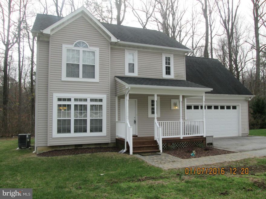 Steps to the Bay !! Move Right In !! Lovely Colonial Home on a Private Lot backing to Flag Pond Park,All New Paint and Carpet,Hardwood Flrs,Open Flr Plan,Kitchen with Breakfast Bar,Master Suite with Full Bath,Oversized Garage,Private Rear Deck for Relaxing !! Your Buyers will Love this Home.Close to Shopping Schools and Restaurants.