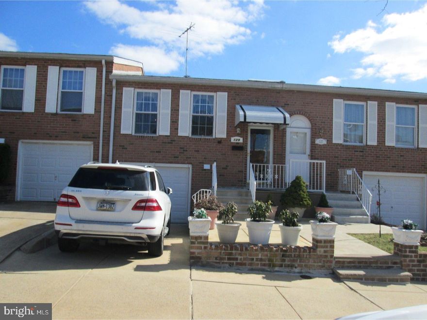 Meticulously maintained 2 bedroom one and one half bath row rancher with finished basement large laundry room and one car garage.  Foyer entrance steps up to the first floor main level consisting of the living room, dining room, eat-in kitchen, hall bath and two bedrooms.  The lower level features a walk-out finished basement, a powder room, a large laundry room, and a one-car garage with inside access.  Tons of storage.  The back yard is fenced-in with a covered patio.  The front features much curb appeal with newer cement, railings, and retaining wall.  "Mrs. Clean lives here."  Easy to show.  Won't last.