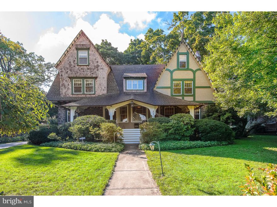 From the moment you step onto this historic home's expansive front porch, you realize you have found one of South Wayne's most treasured properties. Built-in 1890 by developers Wendell & Smith, this picturesque home with its dramatic double gable roofline and detailed architectural features, was designed by renowned architects F.L. and W.L. Price. Located on one of Wayne's most beautiful tree-lined streets, you are walking distance to all that Wayne offers, including the train line, shops, schools & restaurants. However, you may never want to leave the comfort and luxury of your front porch! Enter into the home and into the spacious foyer. Notice the high ceilings, detailed original oak molding & millwork, three large lead windows & gleaming hardwood floors. Continue through the entry into the living room, w/ original oak pocket doors. This comfortable room is accented w/ a double lead window, a wood burning fireplace with an intricately carved mantel & decorative tile and 3 other large windows w/ deep sills. Also off of the entryway is the grand carved oak staircase leading to the 2nd floor. To the left of the front door is the formal dining room, which easily accommodates seating for twelve or more. Lead windows & a built-in corner cabinet are delightful details in this gracious room. Through the dining room, a butlers pantry is conveniently located. A powder room is to the left and the sunny kitchen to the right. This eat-in kitchen surrounded by windows overlooks the private backyard. A door leading to the 3 car driveway is an easy entrance for groceries. Another door leads to a backyard patio. The back staircase to the upstairs is off of the kitchen as are the stairs to the partially finished basement, which is the perfect getaway. In addition to the living area, there is a work/tool bench for the handyman, plenty of space for exercise equipment and multiple storage areas. Proceed up the stairs to the 2nd-floor landing. To the right is the large hall bath with double sink and tub/shower. A 2nd-floor laundry room is ideally located next to the bathroom. The elegant master bedroom is on the front of the house. Two window seats, a walk-in closet along with 2 additional closets & a bright spacious master bath make this room the perfect retreat! 3 other generously sized bedrooms with ample closets are also on this floor. The third floor is comprised of 3 rooms & a hall bath. Now is your opportunity to own one of Wayne's most captivating family homes!