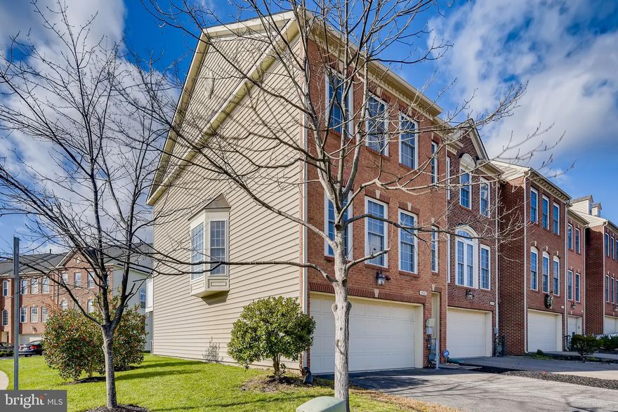 Welcome to this charming end-unit townhouse with a brick front, offering 3 bedrooms, 3.5 baths, a den, and a 2-car garage. *Enjoy the added perk of included some Smart Home features and Level 2 EV Charging outlet  for modern convenience. * The open floor plan floods the space with natural light, highlighting the gleaming hardwood floors. The spacious kitchen features granite counters, complemented by separate living and dining areas. Upstairs, discover roomy bedrooms, including the owner's suite with a walk-in closet, tub, and shower. The finished lower level boasts a full bath and a versatile den or potential 4th bedroom, perfect for a home office. Conveniently located near shopping and restaurants, this home comes with no-pets and no-smoking policy. Make yourself at home in this inviting and well-equipped space. (Some photos are from previous listing.)