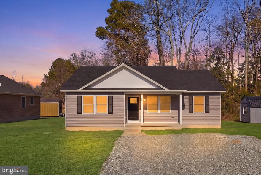 This stunning residence includes four spacious bedrooms (two of which are primary suites), three full bathrooms and 1592 square feet of living space. It’s tucked on an approximately 1/4-acre lot within the amenity-loaded Glebe Harbor community in picturesque Westmoreland County.

A stone’s throw from the Potomac River, within walking distance to pool and clubhouse, tucked in an on-the-water lifestyle community and featuring a modern single-level design, introducing 826 S Glebe Road!

With this location, you have access to a clubhouse, pool, tennis courts, playground, basketball court and boating amenities including three beaches, two boat ramps and two storage areas. The Potomac River lifestyle is all right here and, perhaps best of all, there‘s no HOA!

 Zooming in on the residence itself, open spaces and contemporary touches are in abundance.

This new construction single-story home features a low-maintenance exterior with gray siding, white trim, and black shutters. This home includes both a covered front porch and a covered back porch, providing dual outdoor access and comfort. The property is situated on a level lot with a gravel driveway and is bordered by a natural tree line for added privacy.

At 826 S Glebe Rd, the cute, covered front porch is absolutely perfect for rocking chair or porch swing relaxation. It welcomes you into the stylish, yet functional, open floorplan with high ceilings, LVP floors, upgraded modern finishes & plenty of windows for all that natural light! 

Step into the expansive living room, ready for your personal touch, and fond memories to be made with friends and family! A Convenient Kitchen/Living Room combo makes trips to the fridge quick and easy, or watch your favorite shows while you cook! 

The showstopper of a large, open kitchen features Sleek Quartz countertops, new stainless steel appliances, pantry, and gorgeous custom soft-close cabinetry galore! 

The first spacious primary suite offers a beautiful shower tiled floor to ceiling, an absolutely luxurious Quartz Dual Vanity, and a walk-in closet. 

The second primary suite offers a beautiful shower/tub combo also tiled floor to ceiling, an absolutely luxurious Quartz Vanity, and a closet. 

Two separate, also spacious bedrooms

surround a full bath with Quartz Vanity, and a gorgeous Shower/Tub combo, tiled to the ceiling with exceptional attention to detail. 

Cap it all off with your large, covered back porch for sipping that morning coffee and enjoying the peace and quiet that Glebe Harbor has to offer. Sounds like home to me!

Beyond the Glebe Harbor neighborhood, so much Westmoreland County goodness is within seamless reach. The heart of Montross is within 15 minutes southwest, with Montross Marketplace, grocery, dining and shopping selections. Warsaw, Tappahannock and Colonial Beach are all within a 35-minute drive. The home is serviced by Westmoreland County Public Schools with Cople Elementary, Montross Middle and Westmoreland High School as its designated learning institutions.

 This will be a must-see, single-level home, folks. Inquire today to learn more about the magic that you can call home at 826 S Glebe Rd, Montross, VA 22520.