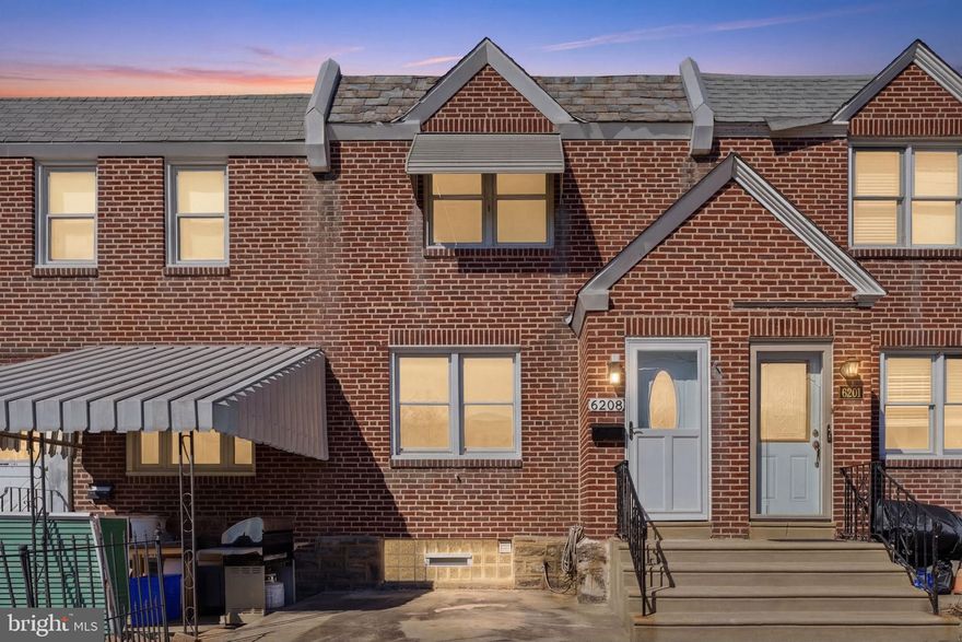 Welcome to 6208 Shelbourne St! This home is fully equipped with a brand new kitchen including quartz counters, subway tile backsplash, crisp two-tone shaker cabinetry, stainless steel appliances, updated hardwood flooring, and thoughtfully remodeled bathrooms. The rainfall showerhead, floor-to-ceiling subway tile, and that black hex niche will make your morning routine feel a little more like a reset than a rush. Outside, the private rear driveway delivers the kind of off-street parking that buyers in the city consistently undervalue until they don't have it.  This means you'll never circle the block looking for parking, which is a convenience that anyone who's lived in Philadelphia knows is worth its weight. Situated on a quiet, well-kept block in the heart of the Lawndale, we are just less than 10 minutes away from Roosevelt Mall, Fox Chase, and Burholme park where playgrounds, batting cages, mini golf, and picnic areas are just waiting for spring to arrive. This home truly has it all. Schedule a tour and come see for yourself.