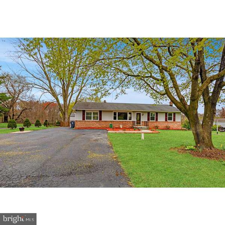 2524 Whiteford Rd is a lovely ranch style home that sits upon a 1/2 acre fenced level lot in the heart of Whiteford. The recently updated kitchen features 42" custom cabinets with granite counters and stainless steel appliances.  There are 3 bedrooms including an en suite with private bath. The second bath features a jetted soaking tub with separate shower. The finished basement has new carpet, a wet bar and walk out to paver patio and the fenced yard. There is a large deck off the kitchen to further enjoy your quiet country lifestyle.