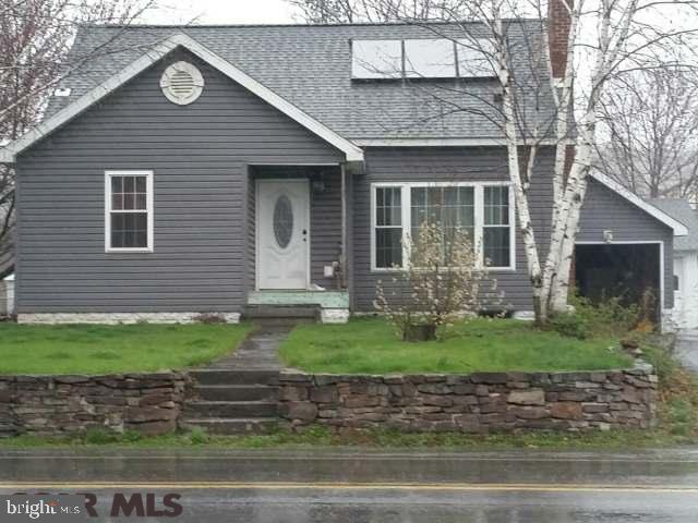 Beautiful 4 bedroom 1 full bath home. This home features living room with fireplace. Updated bathroom. New windows,roof ,siding & 2 heating systems w/AC. & zoned heating. Large deck & backyard for entertaining . Large 2 car garage with workshop. Only 30 minutes to PSU and State College.