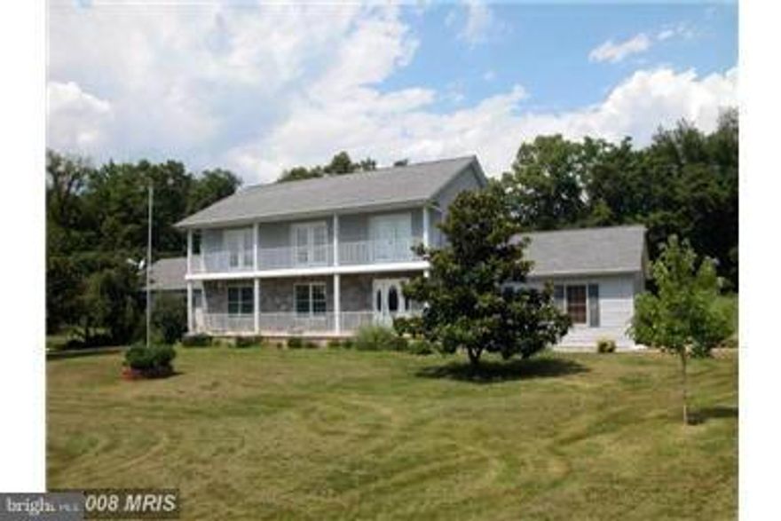 PRICE REDUCED AGAIN!!Spacious 5 BR,3.5 BA 3100 sf Colonial on 2.5 acres in desirable Tabler Estates.2-level covered porch with french doors leading out to second floor porch. Sunken family room W/fireplace,center island w/cooktop in kitchen,formal dinning,breakfast area & 508 sq ft terrace for summer fun. New granite counter tops, new appliances and landscaping.