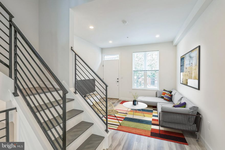 Welcome to 1526 W Seybert Street — a newly constructed, expertly designed 5-bedroom, 3-bathroom home located in the heart of vibrant Francisville, just minutes from Temple University and the thriving Girard Avenue corridor. Now offered at a recently reduced price, this property delivers exceptional value for its size, design, and location.

This spacious and modern 3-story residence offers a smart, flexible layout perfect for today’s lifestyle. Step into the light-filled main floor, where high ceilings and an open-concept design connect the inviting living area to a beautifully appointed kitchen featuring sleek cabinetry, quartz countertops, stainless steel appliances, and a large center island — perfect for cooking, dining, or entertaining. A private rear patio just off the kitchen provides ideal outdoor space for summer grilling or quiet evenings.

The second floor features two generously sized bedrooms, including a rear bedroom with its own en-suite bath, and an additional full hall bathroom. Upstairs on the third floor, you’ll find two more bedrooms, including another rear-facing bedroom with a private en-suite bath and access to the pilot house, which leads to a rooftop deck with sweeping skyline views — an ideal setting to relax or entertain.

A fully finished basement offers a fifth bedroom, third full bathroom, and a dedicated laundry area, creating excellent flexibility for a guest suite, home office, or fitness space.

Located in the heart of Francisville — one of Philadelphia’s most exciting and fast-developing neighborhoods — this home is surrounded by new construction, community energy, and walkable access to Temple University, Aldi, The Met, and countless restaurants, bars, and local conveniences. With multiple SEPTA transit lines nearby, including the Broad Street subway, you’ll enjoy easy commutes to Center City and beyond.

Whether you’re seeking a stylish residence with plenty of room to grow or considering the strong rental demand from Temple University students for current or future income potential, this property is an outstanding opportunity — now available at a compelling new price. Full 10-year tax abatement included.