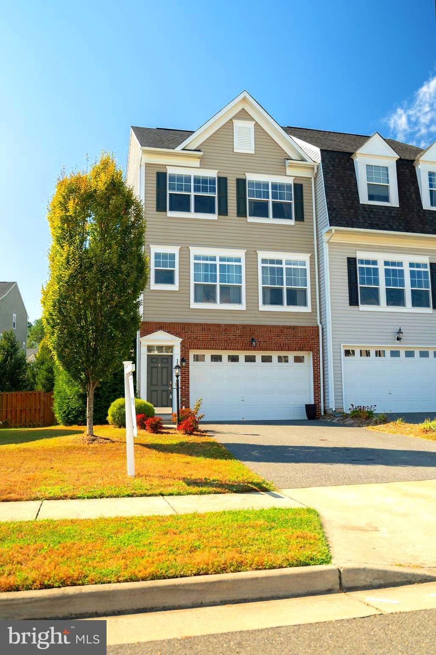 Welcome to this beautifully maintained 3 bed/ 2 full bath/ 2 half bath,  End unit townhome, featuring a two-car garage. Built in 2010, main level features the kitchen with SS appliances, granite counters which opens up to dining and living room with beautiful hardwood floors.  The third floor holds all 3 bedrooms including the laundry!! Large Owners Suite has a  walk-in closet, soaker tub and standing shower.  Fully fenced-in backyard includes a hardscape patio, side entry gate, and large deck with stairs leading to the yard.  Plenty of space in this one - it will go fast! Woodstream community offers onsite amenities feature an outdoor pool, basketball courts, a tot lot playground, and easy access to the trails and fields at Smith Lake Park. Conveniently located right off of Exit 143, it is Next To Quantico, the FBI Academy and within Walking Distance of the Stafford Marketplace which is anchored by Target, Kohls, and Lowes! Plenty of Food option there and you can avoid the Congestion Found on Garrisonville Road! Mark this on your Calendars as a Must See! Don’t let this gorgeous home pass you by it will go FAST!

 Please apply at: https://apply.link/npe6CJ0