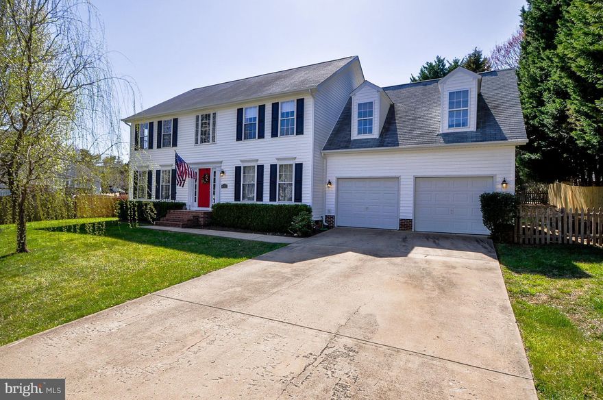 Beautiful Colonial with Open Floor Plan &  2 Story Foyer -  Wood Floors on main level  & 1 BR -  Kitchen with Granite & Stainless Appliances,  Maple Cabinets, Tile flooring - Family Room with Gas Fireplace -  4/5 BR's - Luxury M Bath & Walk-in Closet  - Spacious Laundry Rm/Mud Rm of of Garage  Fenced Yard and  Large Deck & Patio -  Gas & Heat Pump for Heating -  Great Location