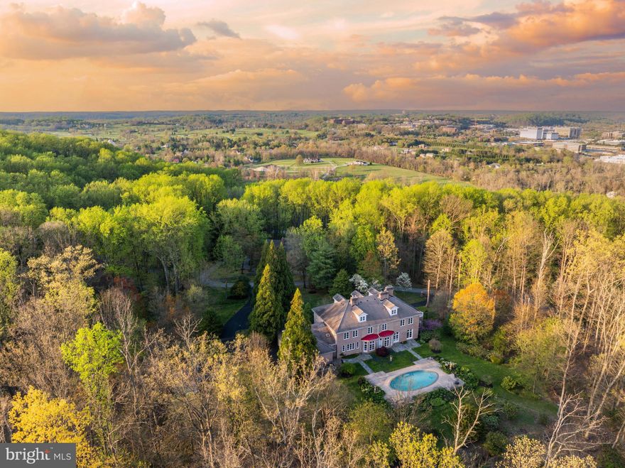 Live authentically. Stunning brick estate perched atop 3.01 acres with glorious long panoramic views. A true lifestyle estate. Enjoy incredible access to all 1,043 acres that Oregon Ridge Park has to offer. Meet everyday invigorated after a healthy hike in the park just a few steps away. Enduring architecture. Balanced spaces with abundant light. A meticulously built home with unparalleled attention to detail. Share savory meals with your loved ones in this handsome kitchen. All gathering spaces flow seamlessly to your gracious outdoor living. Envision yourself floating down the custom, one of a kind grand stair to unwind in your own private oasis. Imagine the lush greenery under your feet and experience the thoughtfully landscaped grounds which invite you to immerse yourself in the scenery. A setting that lives like a landscape painting. Revel in all the seasons... from spring blooming... to trees ablaze with color in the fall. Just minutes from Hunt Valley Town Center and Greenspring Station while feeling worlds away. Cultivate your existence. The art of uniting human and home.