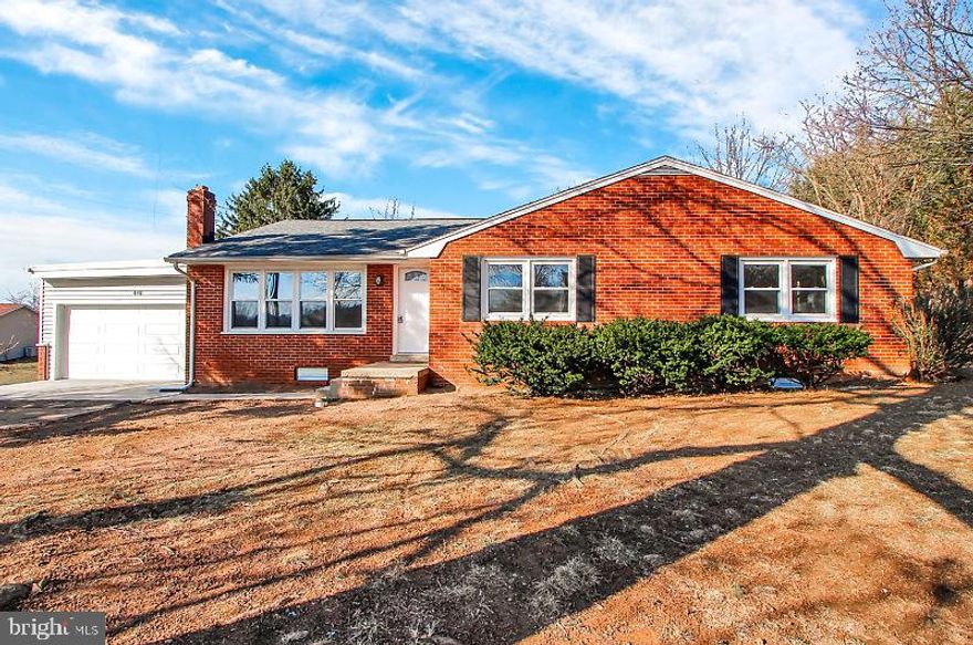 SELLER WILL PAY BUYERS CLOSING COSTS UP TO 6%. 100% USDA FINANCING AVAILABLE. THIS WILL GET YOU INTO PROPERTY WITH HARDLY ANY MONEY. Newly renovated rancher!  This home has been updated from top to bottom.  This stunning all brick rancher sits on close to a half acre of land with a beautiful, spacious and private back yard and mountain views.  The home has an oversized large patio, and an extra large 3+ car garage, with access from front and back yard.  This charming home has 4 bedrooms with a master bath, updated kitchen, and hardwood floors throughout.  Family room on lower level features its own half bath and separate laundry.  Priced to sell, this home is move in ready and awaits you!  NEW FENCE TOO!!!!