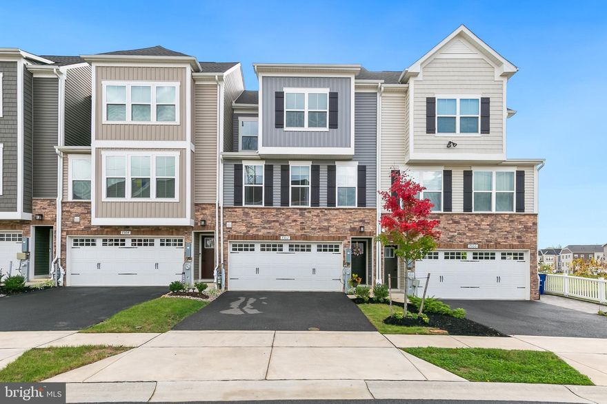 Welcome to 7302 Isabella Road — a stunning 2022-built home with no updates needed! This modern 4-bedroom, 2.5-bath beauty offers an open and bright floor plan with stylish finishes throughout. The gourmet kitchen features white quartz countertops, 42" cabinets, stainless steel appliances, and a large island perfect for entertaining. Enjoy the spacious owner’s suite with a walk-in closet and a luxurious bath featuring a double vanity and sleek modern design.
Relax year-round on the covered rear deck with a cozy fireplace — ideal for outdoor dining or quiet evenings. The community offers exceptional amenities, including a pool, clubhouse, playground, and gathering spaces. Conveniently located with easy access to major commuter routes including I-95, MD-29, and Route 216, this home provides a perfect balance of comfort, convenience, and style.

Don’t miss this move-in-ready gem in a sought-after Howard County location!