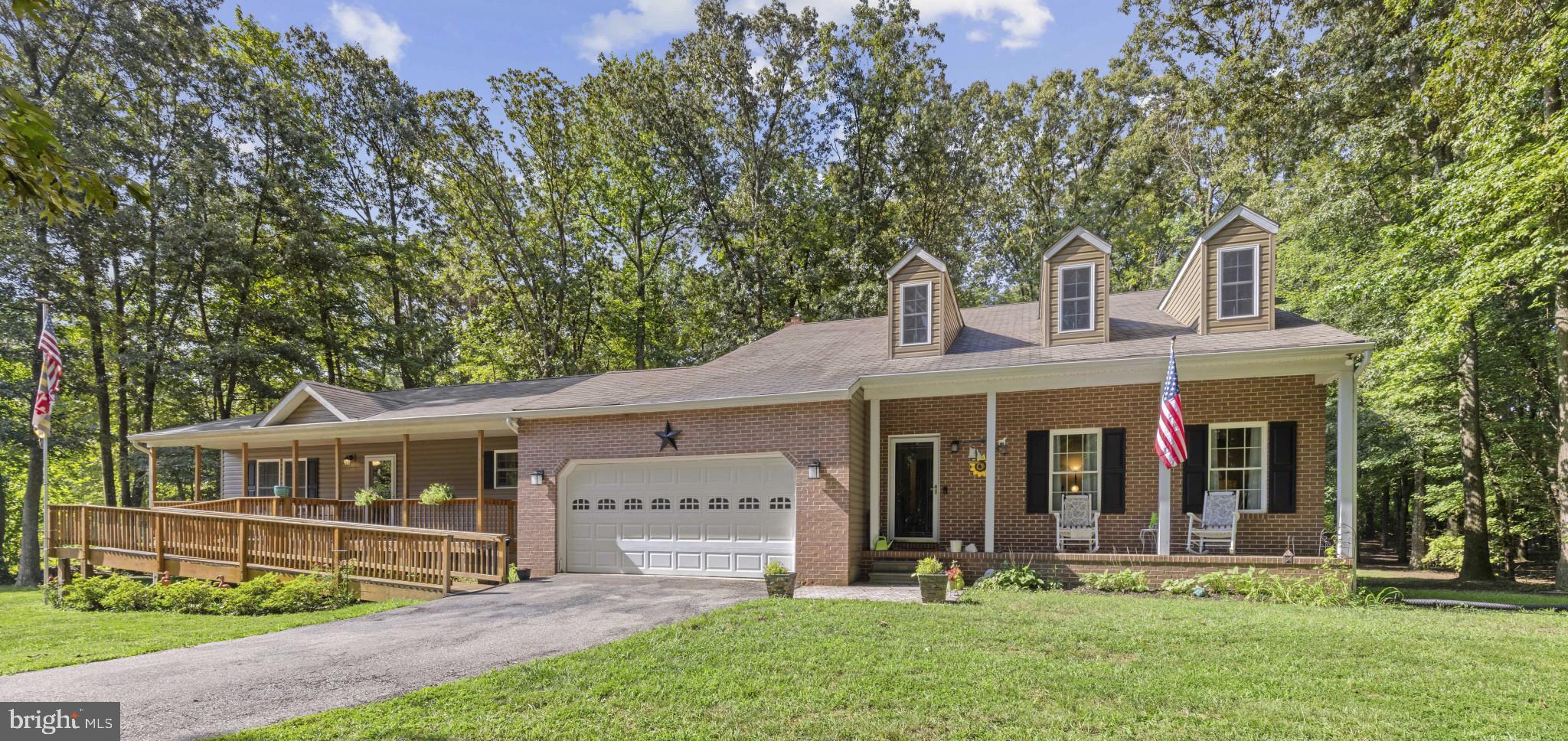 Welcome to this meticulously maintained property nestled on 2.34 private acres in the highly desirable Chasewood Run community of Pasadena, MD. This unique home offers a rare combination of privacy, space, and flexibility—perfect for multi-generational living or rental income potential.
The main home features 3 spacious bedrooms, 2.5 bathrooms, and a welcoming great room that sets the tone with its vaulted ceilings and natural light. The formal living and dining rooms provide elegant spaces for entertaining, while the updated kitchen flows seamlessly into the heart of the home.
Attached to the main house is a private apartment suite, complete with 2 bedrooms, 1 full bath, a full kitchen, living room, and a separate private entrance—ideal for extended family, guests, or additional income.
Outdoors, enjoy the peace and seclusion offered by the tree-lined lot, while still having room for all your hobbies and storage needs. A two-car attached garage is complemented by an additional one-car detached garage in the backyard—perfect for a workshop, studio, or extra storage.
Brand new Septic and Drain fields 2018
This one-of-a-kind property combines comfort, function, and privacy, all within close proximity to shopping, dining, marinas, and commuter routes.
Don’t miss your chance to own this private retreat in one of Pasadena’s most sought-after neighborhoods!
