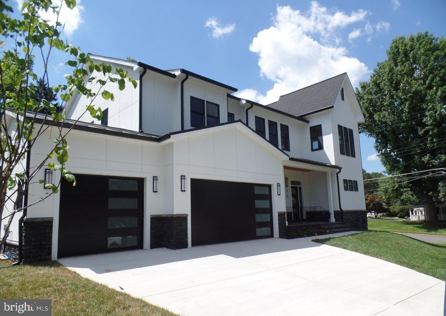 Brand New - Modern Farmhouse with all the bells and whistles including an Elevator!!  6 Bedroom/5 full baths/2 half Baths! 3 Car Garage wired for Car Charging Station.  Great entertaining space inside and out!  Screened in Porch and an open Deck.  Don't miss this amazing home in a great neighborhood and a great location - between 2 Metro Stations.  Too many upgrades to list, please see features list in documents as well as floor plans.