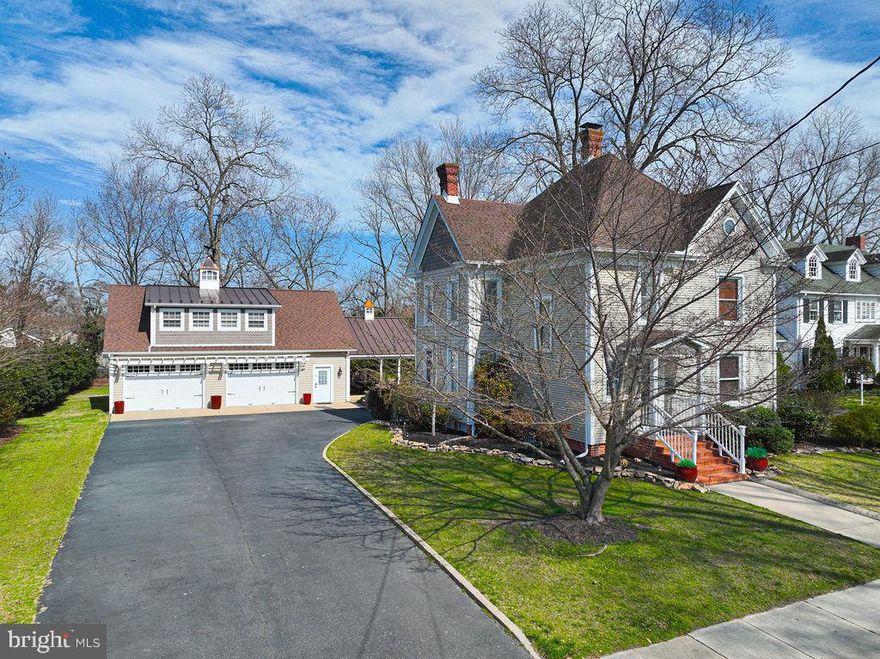 WOW!   If you are looking in the Pocomoke area, this is one of the finest homes offered for sale in quite awhile!    Look no further—this beautifully updated property has it all. Located in a charming small town in Worcester County, you’ll enjoy the perfect balance of coastal access and community living. The home is just 30 minutes from Ocean City, MD, 30 minutes from Chincoteague, VA, and only a few blocks from the scenic Pocomoke River. Even better, kids can walk to award-winning public schools, the MarVa Theater, and the Delmarva Discovery Center.
Step inside to find a fully remodeled kitchen featuring granite countertops, tile backsplash, stainless steel appliances, and a convenient bar that opens to the dining area. The dining space is highlighted by a cozy gas fireplace, perfect for gatherings. Hardwood floors run throughout the kitchen and much of the main level, which also includes a comfortable family/TV room off the kitchen, a half bath, and an additional spacious living room.
Upstairs, you’ll find three bedrooms and two full bathrooms, all with beautiful hardwood flooring. During the colder months, you’ll appreciate the heated floors in the primary bathroom. The attic offers walk-up access and full flooring, providing excellent storage or future possibilities.
If entertaining is your passion, this property truly shines outdoors. The highlight is a 30’ x 40’ Amish-built custom garage with a second floor offering 1,900 square feet of finished space, complete with HVAC and gas heat—ideal for recreation, hobbies, or additional gathering space.
Connected to the garage is a 16’ x 24’ pavilion with bar seating and a fully equipped outdoor kitchen featuring granite countertops, a built-in Blaze commercial stainless-steel grill with dual side burners, and a Big Green Egg smoker. The upper-level patio provides 500 square feet of space, and just off the pavilion is an additional 450-square-foot patio with a custom gas fire pit. With LED lighting throughout and 1,334 total square feet of outdoor entertaining space, the possibilities for hosting friends and family are endless.
Additional recent upgrades include a complete crawlspace encapsulation with dehumidifier, alarm system, and a water treatment system.    Upstairs HVAC replaced with dual fuel heat pump.  Gutter guards installed on home and garage.    New roof on shed.
Homes like this rarely come available--schedule your showing today before it’s gone.