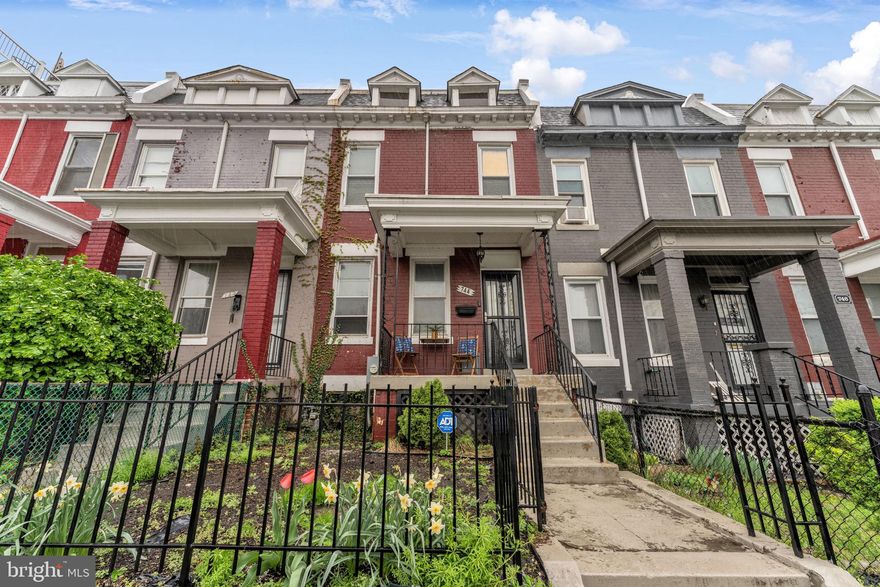 Welcome to this beautiful and quintessential DC brick rowhome, ideally located in vibrant Columbia Heights! This charming 2-bedroom, 2-bath residence seamlessly blends historic character with modern updates, featuring hardwood floors throughout, tall ceilings, and recessed lighting that enhance the bright, open floor plan.  The heart of the home is the stunning 2021-renovated kitchen, complete with Quartz countertops, custom cabinetry, a stylish backsplash, gas cooking, and stainless steel appliances—ideal for home chefs and entertainers alike. Just off the kitchen, step onto your private rear deck—perfect for morning coffee or unwinding in the evening. A welcoming front porch adds even more charm and a cozy space to connect with neighbors. Upstairs, you'll find two sun-drenched bedrooms and a beautifully renovated full bath (2021), while the versatile lower level can serve as a third bedroom, home office, or den, offering flexibility to suit your needs. This home is just steps from a wealth of amenities, including the bustling 14th Street corridor with Target, Giant, and countless dining options. Enjoy neighborhood favorites along 11th Street such as El Chucho, Red Rocks, Queen's English, and The Coupe. The brand-new Whole Foods is only 0.8 miles away, and you're also close to parks, shopping, and downtown DC.
Commuting is a breeze with easy access to the Columbia Heights Metro (Green/Yellow Lines), multiple bus routes, Capital Bike Share, Zipcar stations, and the Bruce Monroe Community Center featuring sports facilities and a community garden. Don't miss your chance to own a classic piece of DC charm in one of the city’s most desirable neighborhoods!