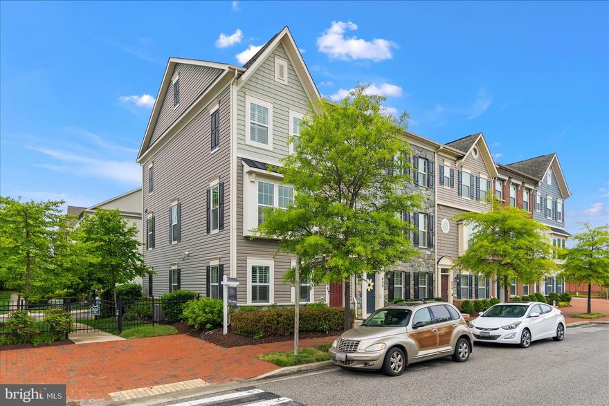 You will love this large, move-in ready townhome. Super clean! Side windows on this end-of-group beauty give this unit an even better bright and open feel. Three finished levels with beautiful wide hardwoods. Gourmet eat-in kitchen with granite countertops, two tiered island with sink, newer dishwasher, refrigerator and microwave.  Primary bedroom suite with large walk-in closet with storage system. Primary bathroom with shower and separate soaking tub. Two car garage! Convenient bedroom level laundry room with newer washer and dryer. Custom plantation shutters throughout. Large composite deck off of kitchen.  Wide crown moldings. Architectural details. Recessed lighting. Versatile neutral colors.  New garage door opener. Walkable to shopping, restaurants and Annapolis amenities.  Convenient to transportation hubs.
