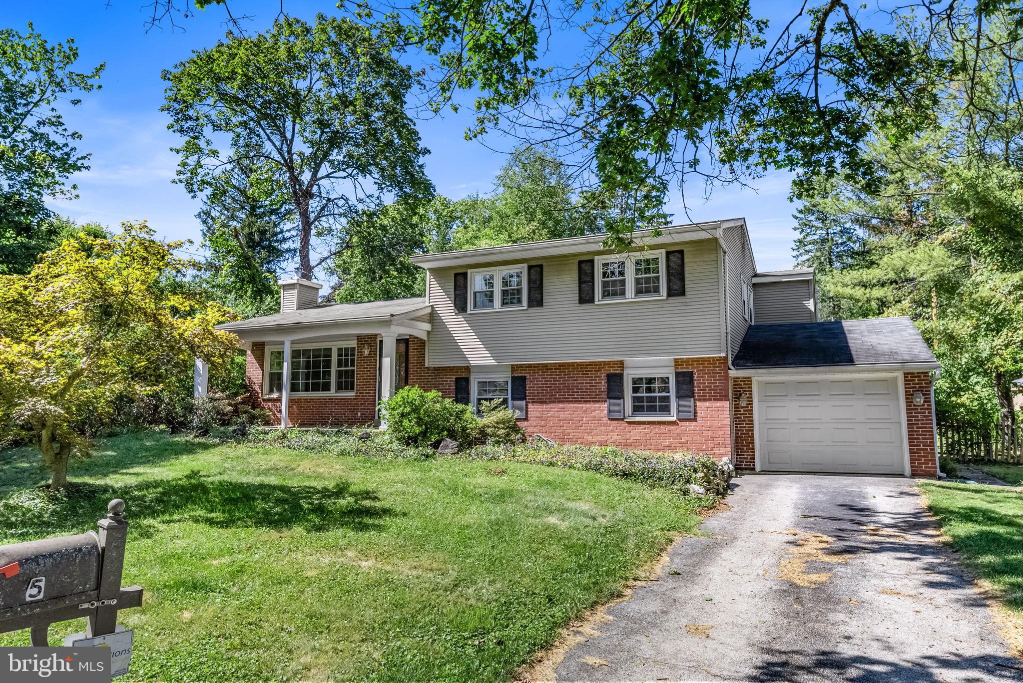 Welcome to 5 Beth Ln.! This spacious 3 bedroom, 2 ½ bath split level is ready for a new owner to make it their own! Home is being SOLD AS-IS! Located in an established neighborhood in Great Valley SD, nearby to major routes, businesses and shopping. There are hardwood floors throughout the main and upper floors. The living room has a large picture window for added brightness and a wood burning fireplace. Directly behind is the large kitchen with a dining area that opens up into a large solarium right behind that has a cathedral ceiling, recessed lighting and ceiling fan. There are lots of windows for lots of natural light and French doors that lead to the back patio with a pergola. The kitchen offers lot of counter space to spread out and cook with an electric range and an attached counter with pendant lights and seating for at least 6 people, under cabinet lighting, and recessed lights. Take the oak tread stairs to the upper level where you will find a hall bath at the top with a skylight and then the Primary Bedroom with a ceiling fan, walk in closet and a full bathroom with a shower stall. The 2 additional bedrooms each have double windows and ceiling fans. There is attic access in the upper hall and also a separate one in the 3rd bedroom that leads to over the living room. Make your way to the lower level on a 2nd set of oak tread stairs where you will find a large Family room area with recessed lights, a closet and access to the 1 car garage. There is also access to a crawl space that goes under the living room. Tucked off the one side is a ½ bath with a pedestal sink, the utility/laundry room with a door that leads to the back yard and an additional bonus room that could be used as an in home office or playroom. Outside you will find a nice level back yard which is perfect for entertaining and outside games and also a built in back closet behind the garage for added storage. This home is priced to sell and ideal for someone who is looking to do the updates themselves.
* All dimensions of lots and building/room sizes is approximate and should be verified by the Buyer(s) for accuracy. *
