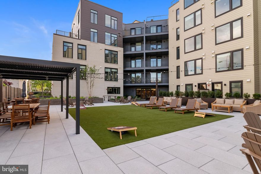 Welcome home to The Aidan! Located in the heart of Old Town Alexandria, this gorgeous brand-new condo is the perfect combination of modern elegance, comfort, and convenience! Inside the entrance, discover a stylish kitchen, boasting abundant bright cabinets, including granite countertops, and stainless steel appliances, including an enviable Bosch dishwasher. This home is ideal for entertaining, with the oversized island bar opening the kitchen into the spacious living room, where floor-to-ceiling windows bathe the living room in an abundance of natural light. Off of the living room, your bedroom includes a large walk-in closet and a stunning en suite bathroom that includes a luxurious frameless-glass door shower with built-in seat and contemporary finishes. This newly constructed community offers an abundance of amenities including assigned parking in a secure garage, on-site fitness center, community room, business center, pet washing station, and amazing outdoor spaces like a rooftop patio and grill. All of this and more is located conveniently less than half a mile to the Braddock Street Metro Station and less than one mile to both lively King Street and the Alexandria Waterfront. Just minutes to Harris Teeter, Trader Joe’s, Murphy’s Grand Irish Pub, Pop’s Old Fashion Ice Cream, Misha’s Coffee, Torpedo Factory, and Oronoco Bay Park. Quick access to Route 1, I-495, I-395, and Duke Street. Schedule a private tour of your pristine new home and live your best life all Summer long!