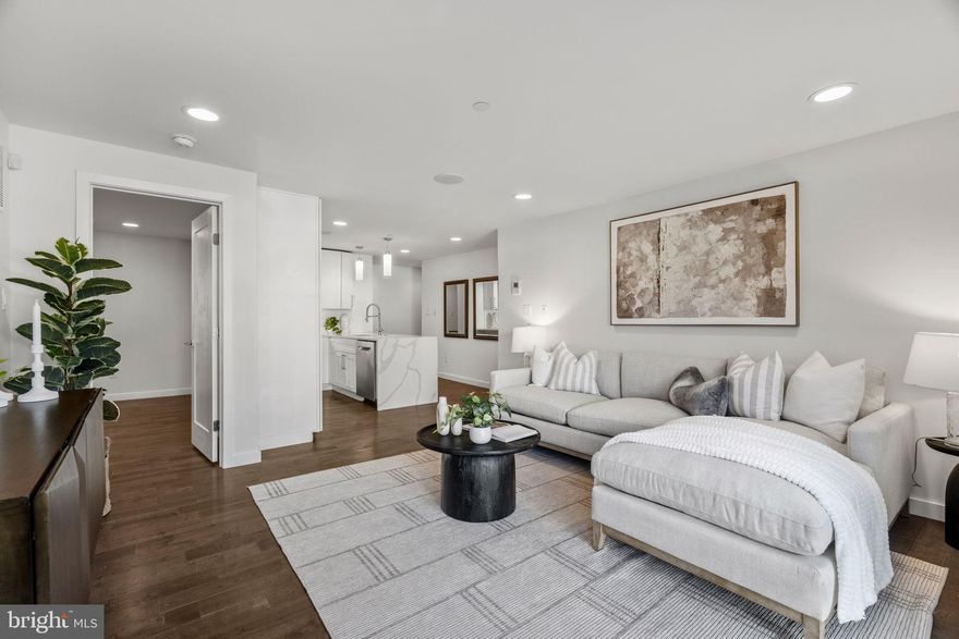Enjoy living in the heart of Fairmount in this spacious, newer construction bi-level condo that includes one-car PARKING. This home has been freshly painted and is ready for you to move right in! The open layout creates a welcoming flow between the kitchen, dining, and living areas, featuring wide-plank oak hardwood floors throughout with floor-to-ceiling windows that bring in warmth and natural light. The kitchen is a standout with Calacatta quartz countertops and waterfall edges, a full GE stainless steel appliance package, and room for bar stool seating. The main level includes a generous sized bedroom with a large walk-in closet, a full bathroom with a tile surround tub shower, and a convenient coat closet. Upon entering the lower level, you will note a flexible second living space, an additional bedroom or office, and another full bathroom with a double vanity and tub shower. Find a sizable closet for storage as well as the laundry closet. The primary suite features a large custom walk-in closet and a spa-inspired bathroom with a double vanity and a large walk-in shower. Built-in speakers in the primary suite, bathroom, and living area add a modern touch. The condo also includes a personal storage locker within the building and access to a large shared roof deck with panoramic views of the Center City skyline. 753 N 20th St Unit #1 is conveniently and centrally located just steps away from the Philadelphia Museum of Art, Barnes Foundation, Kelly Drive and the Schuylkill River Trail, and of course, Fairmount Park. Walk to and explore the many shops, cafes, and restaurants along Fairmount Ave, and indulge at nearby favorites including Sandwich Corner Market, Musette, Bar Hygge, Zorba's, Fare, and A Mano. This home is a must-see, especially if you have been looking for a walkable neighborhood that is next to green space with an abundance of things to do and see. Don’t miss out - schedule your showing today!