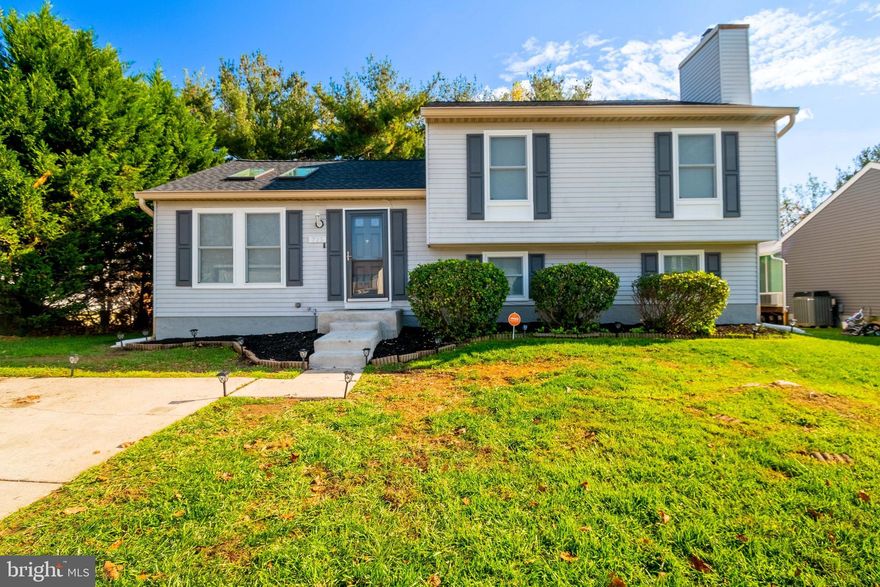 Beautiful home awaits it's new owner.  Freshly painted and wood floors.  Roof, sky lights, windows and doors replaced May 2022.  Nice private backyard, this home is the perfect oasis after a long day and lots of room to entertain when the mood hits.  Nestled on a quiet cul de sac, this is a terrific find just waiting for you.  Come see this home ad make it yours.  One year HSA Home Warranty included.