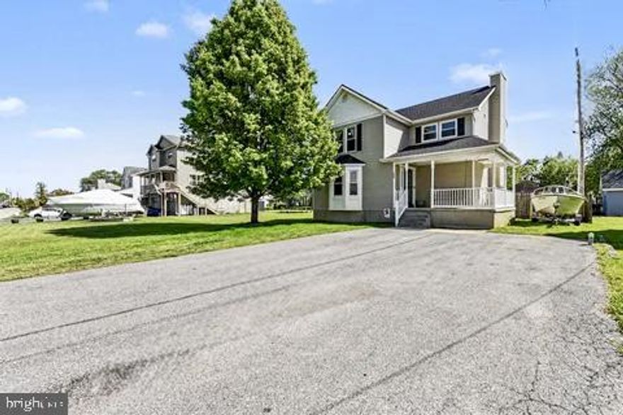 Welcome to 7333 Greenbank Road, a beautifully updated home in the highly desirable, water‑oriented community of Oliver Beach. This detached property offers 4 bedrooms and 2.5 baths, with a comfortable and functional layout ideal for everyday living and entertaining. Enjoy peaceful water views right across the street, adding a relaxed coastal feel to the home. Inside, you’ll find bright, welcoming spaces including a renovated kitchen with granite countertops, stainless steel appliances, and a large pantry. The kitchen opens to a spacious family room featuring a cozy fireplace, while a separate dining room and convenient half bath complete the main level. Upstairs, the home offers generously sized bedrooms, including a primary suite with an updated en‑suite bath and a walk‑in closet designed for comfort and privacy.
Step outside to a private backyard, complete with an above‑ground pool for warm‑weather fun. Major improvements provide peace of mind, including a renovated kitchen and bathrooms, roof replaced in 2024, HVAC in 2021, windows in 2021, and a new hot water heater in 2025. Residents of Oliver Beach can enjoy an optional community membership for just $30 per year, offering access to boat ramps and the community clubhouse. Don’t miss this opportunity to own a home that combines space, charm, and water views. Schedule your appointment today—Home Is Where Your Story Begins!