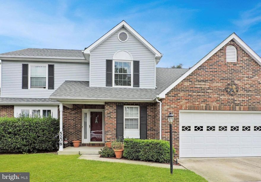 Gorgeous Colonial in Dorchester. 4 bedrooms, 2.5 baths, 2 car garage. Stone patio in back yard