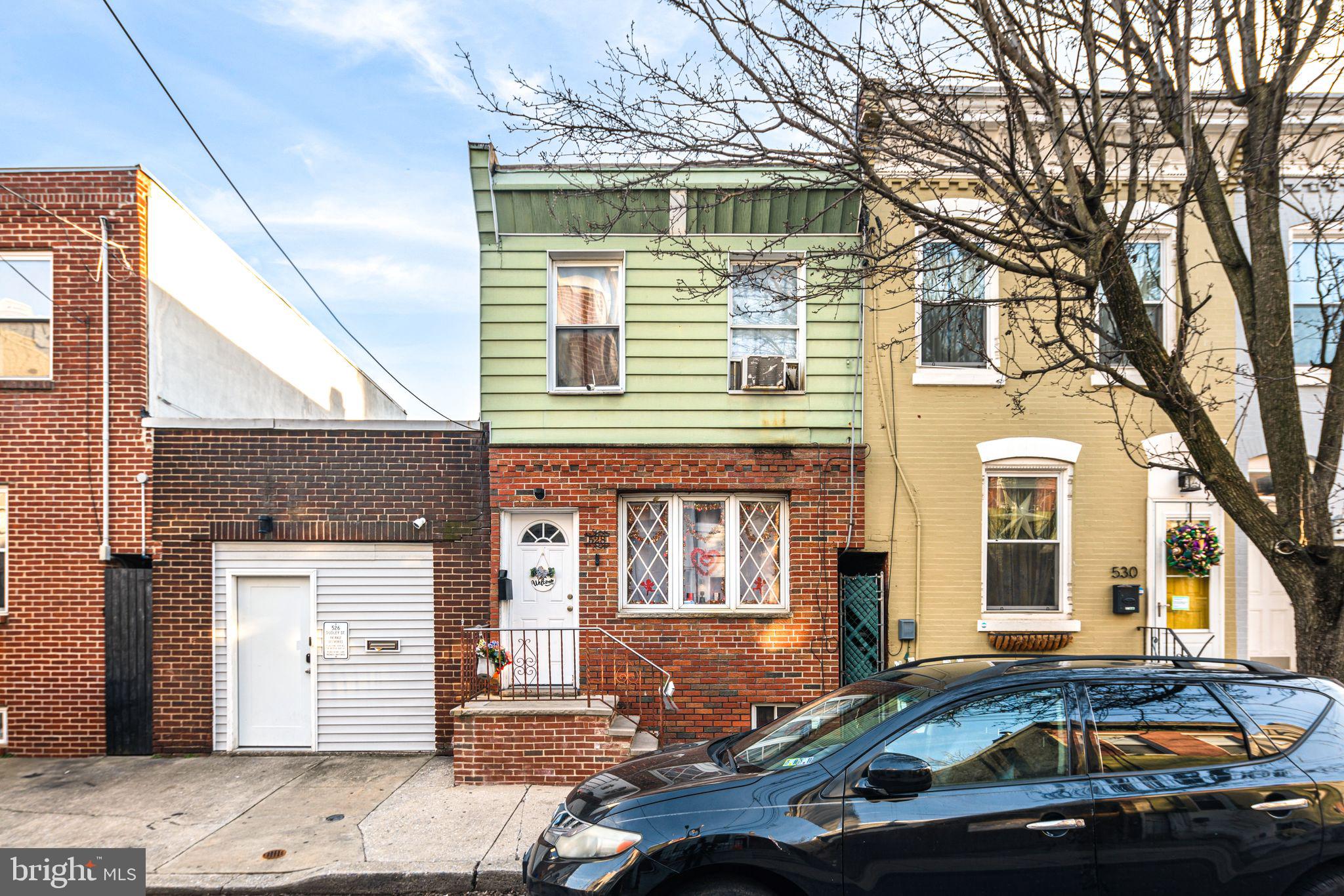 This home is a fantastic opportunity for investors or homebuyers looking for a renovation project in one of South Philadelphia’s fastest-growing neighborhoods. Whether you're an investor or a buyer eager to customize your dream home, this property offers incredible potential.
The first floor features two living spaces, which could be opened up for a more modern, open-concept flow into the kitchen at the back. Upstairs is a unique layout with three rooms and one full bathroom—including a spacious primary bedroom at the front and a secondary bedroom at the back with a walk-through to an additional space, perfect for a home office, expanded bedroom or closet. The home also includes a private patio, ideal for creating an outdoor oasis, and a basement with good ceiling height, providing ample storage or potential for additional living space. The roof has been well maintained, offering peace of mind for future owners.Located in South Philly’s vibrant Dickinson Narrows neighborhood, this home is just minutes from sought-after areas like Passyunk Square and Pennsport, which are known for their top-rated restaurants, cafés, and boutique shops. With easy access to public transportation, I-95, and I-76, commuting is a breeze. The nearby sports stadiums, shopping districts, and entertainment venues add even more convenience and lifestyle appeal. With its prime location and potential for customization, 528 Dudley Street is a fantastic opportunity for homebuyers and investors