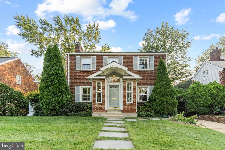 Classic, expanded Arlington Colonial nicely set back from the street on a flat 7,572sf lot. Large slate pavers lead to a covered front portico and into a light and bright foyer with ceramic tile and a coat closet. Formal living room features a brick wood-burning fireplace and mantel and French door access to the sunroom featuring a separate exterior entrance. Elegant formal dining room leads into the kitchen and features chair rail molding and a built-in corner cabinet. Eat-in chef’s kitchen has many wonderful features, is light, bright and open to the expansive family room. Kitchen has gorgeous wood cabinetry stretching to the ceiling, granite countertops, ceramic tile backsplash, stainless steel appliances, under-cabinet task lighting, wood floors and plenty of room to work and entertain. Family room area with loads of windows overlooking the backyard also looks into the kitchen, with breakfast area and a large pantry. Rear screened porch features vaulted ceilings and leads to a large and open deck, with stairs down to the beautifully manicured fenced-in backyard. Upper level with freshly refinished hardwood flooring throughout features four bedrooms, two full bathrooms and loads of storage. Owners suite has vaulted ceilings, picture frame window, dual closets, abundant room for a sitting area/desk area, and a spa-like en-suite bathroom. Owners en-suite bathroom features an air-jet tub, ceramic tile surround, linen closet, built-in speakers and plenty of counter space. Second, third and fourth bedrooms get great natural light, have ample closet space and share a hall bathroom. Upstairs hall bathroom has a new vanity, light fixture, toilet, and features a deep bathtub. Lower level enters from the kitchen and family room area and has a rec room, dedicated utility space, laundry room with a second refrigerator, and a renovated full bathroom with standup shower. Backyard is stunning and private with a great balance of abundant, meticulously maintained lawn as well as mature landscaping. Location is superb, across the street from an Arlington park, less than one mile to East Falls Church Metro, easy access to I66 without the highway noise, and a short trip to many local restaurants, as well as grocery stores, all within minutes! BRAND NEW HVAC 09/2021!