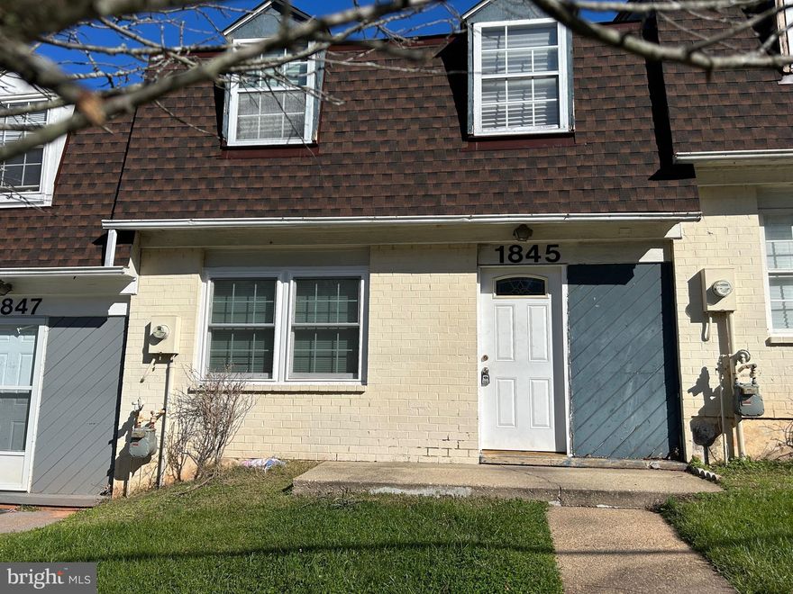 Two level Townhouse Condo  - with 3 bedrooms, 2 full bathrooms, Living/Dining room combination and a Galley kitchen.  The Main Level has a full bathroom with a rear room that can be used as a bedroom or a family room. There is a patio and privacy fence in the rear of the home. The Upper Level has 2 nice sized bedrooms, a full bathroom and the Laundry room with washer/dryer and furnace.  This home features a  New roof, stove, exhaust fan and a like new water heater. There's plenty of storage closets, and you get one assigned parking space!  This is an AS-IS Estate.