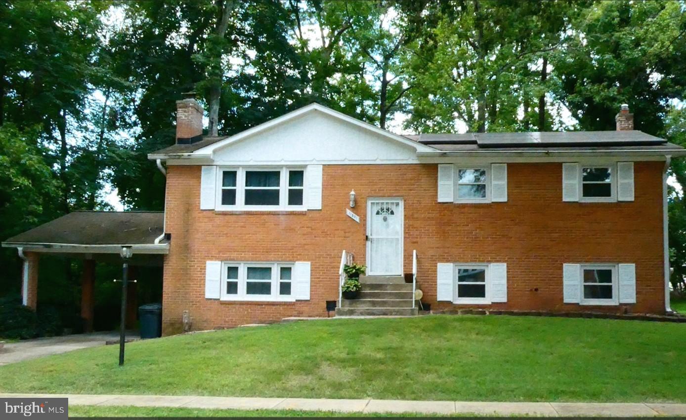 Charming 3-Bedroom Split Foyer Home Beside a Park-Like Setting
This delightful split foyer residence offers the perfect blend of comfort, functionality, and natural beauty. Nestled on a serene, tree-lined street, the home enjoys a peaceful park-like setting that feels like a private retreat. Located on a quiet, picturesque street shaded by mature trees. Backyard opens to a park-like area—ideal for relaxing, entertaining, or watching wildlife. Driveway and extended carport provide ample parking. Split foyer design offers separation of living and entertaining spaces. Includes original hardwood floors throughout 1st floor. Primary Bedroom: Includes an en-suite full bath and generous closet space. Two additional bedrooms: Ideal for family, guests, or a home office. Second full bath conveniently located near the secondary bedrooms. Lower Level: Family Room: Cozy and versatile—great for movie nights, hobbies, or a playroom. Half bath easily accessible for guests and everyday use. Laundry Room: Spacious with storage options. Solar panels completely paid - no loan.