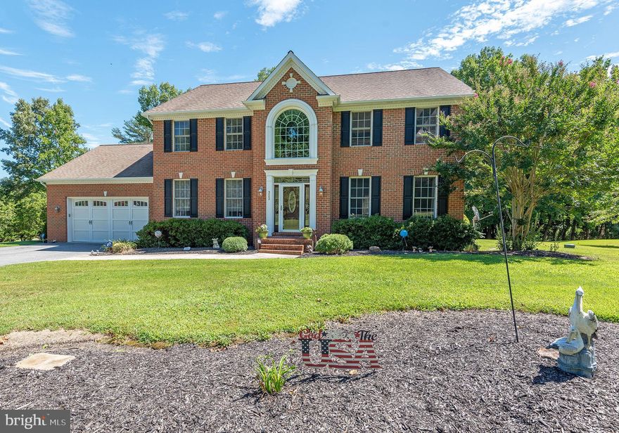You will love the touch of tradition on this 3200+ square foot colonial on country size lot of 1.37 acres! Enjoy the elegant brick front with huge Palladian window above the entry and a 2-car garage. Bright & airy open foyer, formal living room with crown molding, formal dining room with graceful columns, chair rail, and crown molding. Freshly refinished, wide planked wood floors on most of the main level. The Chef in you will love the 5-burner gas cooktop, wall oven, and built-in microwave to create your favorite meals. Stainless steel appliances, granite counters, lazy susan corner cabinets, glass front display cabinet, recessed lighting, and pantry. The breakfast room has lovely cathedral ceilings and is sun filled with natural light from all the windows. The adjacent family room has floor to ceiling stone fireplace with pellet stove insert for cozy winter evenings and windows on either side to take in the view. Recessed lighting, ceiling fan, and French doors to the formal living room complete this wonderful area to gather with friends and family. The mud/laundry room has cabinets for storage and a utility sink and powder room are conveniently located on this level. The upper level has an amazing master suite with tray ceiling, recessed lighting, ceiling fan, and walk-in closet with custom organizers. Relax after a long day in your whirlpool, Jacuzzi tub. Tile floors and surrounds, dual sinks, and separate shower finish this lovely bath. Large secondary bedrooms and huge hall bath with dual sinks for sharing complete the upper level. The 1532 square foot lower level has 10' ceilings and is awaiting your finishing touches. Anderson windows, 2-zoned HVAC systems, pull down attic steps, ring doorbell and more. The exterior offers a deck for 'al fresco' dining, wooded buffer along the back, and a shed for storage. No HOA! Store you RV, boat, and more on your lot! Choice location near Rts 32, 3, 97, 50, 95, 295, BWI, train, shopping, restaurants, and more! Stop by! This home is destined to steal your heart!