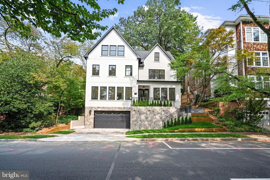 This is a bespoke new construction home that was recently appraised at $5M.  The seller has repriced it at an exceptional value, under $4M for immediate sale.  The seller is prioritizing clean offers with strong terms and closing timelines.   At this price, the property is offered as built.  The prior RH lifestyle package, elevator installation, and closet customization offerings can only be discussed with stronger offers or enhanced terms.  Secure immediate equity, security and long-term value in a volatile market.
Welcome to 5631 MacArthur Blvd NW — A rare bespoke 7,000+ sq ft new-construction residence in DC’s coveted Kent neighborhood, blending architectural brilliance with a fully curated luxury lifestyle. Purposefully designed for elegance and everyday ease, this 6-bedroom, 7-bath home offers soaring 10 ft ceilings, expansive windows, and refined finishes throughout. Move seamlessly into a residence that is not only architecturally stunning but fully tailored to elevate the way you live.

Features and Finishes:
Elevator-ready shaft for effortless access to all levels.
Multiple wet bars & entertainment spaces.
Ensuite baths with marble flooring for each bedroom. 
Multiple outdoor spaces.
Kitchen: Custom walnut cabinetry, quartzite countertops, dual dishwashers, and premium Viking & Thermador appliances.
Outdoor terrace.
Generous walk-in closets.
Two car garage and a three-car parking pad.

The Details:
Six ensuite bedrooms with walk-in closets. Waterworks and Kohler plumbing fixtures, soaring 10-ft ceilings, solid wood interior doors with Emtek lock sets and pivot hinges, Andersen windows, and custom millwork throughout. The primary suite offers a 14-ft cathedral ceiling, private terrace, and oversized walk-in closet. 

Location Highlights:  Ideally located, this residence is walkable to Georgetown and Palisades dining and convenience to include  Starbucks, CVS, the UPS Store, USPS, acclaimed dining (Et Voila, Bambu Asian Cuisine, Aracosia, Sweet Agave, Chen's Gourmet), Palisades Key Elementary and Palisades Recreation Center, minutes to Georgetown and Sibley Hospital, with easy access to top private schools and cultural landmarks.

This home is available for private showings by appointment only.  Please contact listing agent for upgrade menu, appraisal summary and full spec sheet.  Experience a residence that redefines turnkey luxury in Washington, DC.