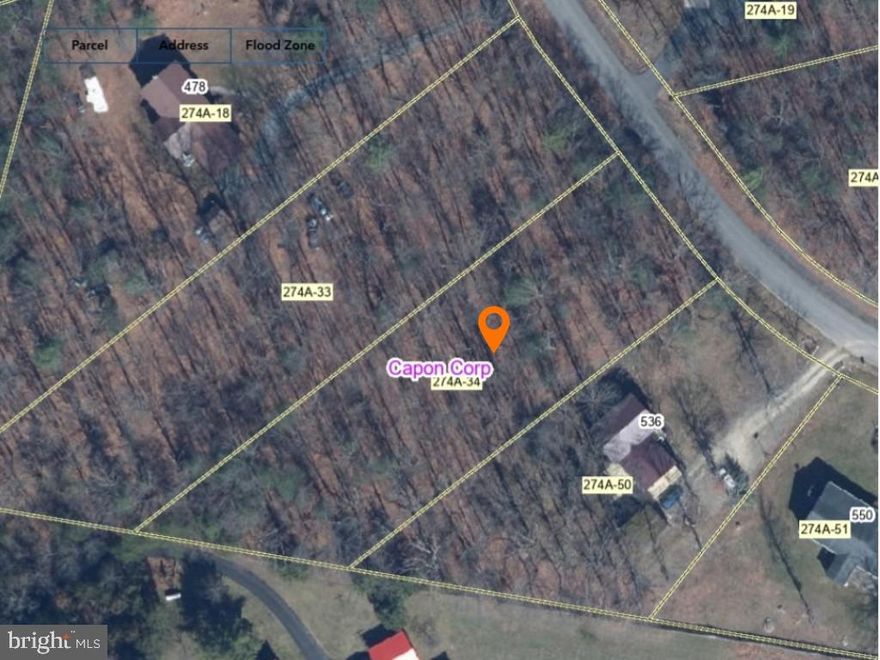 DESIRABLE BUILDING SITE, 0.82 wooded acres in quiet, sought after WARDEN ACRES with public water/sewer hook-up & fiber optic internet available. Community park &  pavilion are just down the street. Lot 54 is barely 2 miles from the town of Wardensville offering Farmers Market, Restaurants, Coffee Shop, Antiquing & more. Nearby recreation opportunities include, but are not limited to, George Washington National Forest, Trout Pond, & Warden Lake. Less than 30 minutes to I81/66 & under 2 hrs to D.C.