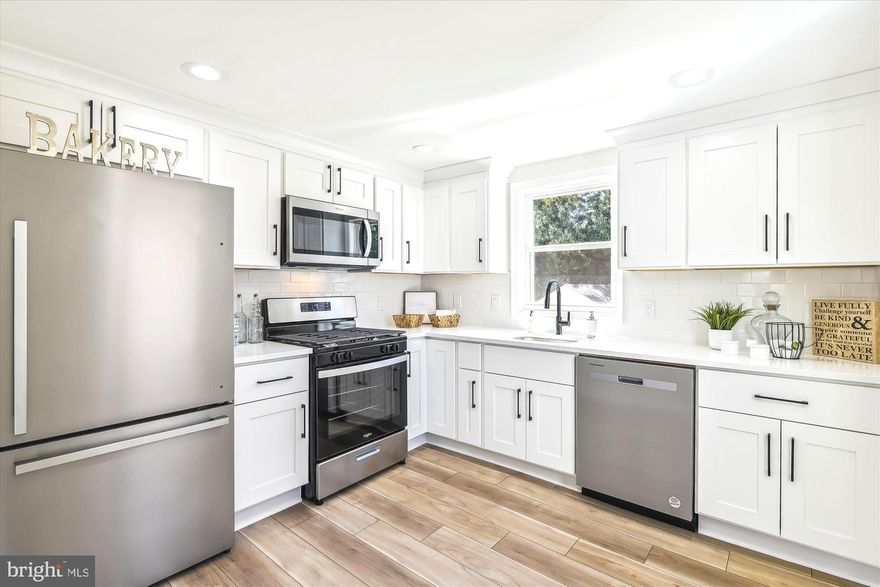 PRICE IMPROVEMENT! The Cape Cod-style home is known for its charm and coziness.  In 2023 this beautiful home underwent MAJOR RENOVATIONS inside and out with high-end finishes!   This home features 3 bedrooms and 3 full bathrooms,  luxury vinyl plank flooring, beautiful white kitchen cabinets, quartz countertops, new stainless steel appliances,  new roof and gutters, new windows, new HVAC,  updated electrical, and much more!  The basement is fully finished and features 9-foot ceilings. This lovely home is situated on a nice lot with a private driveway leading to an oversized detached 1-car garage and is conveniently located just a few minutes from the Coast Guard base and with easy access to Annapolis, DC, and Baltimore.