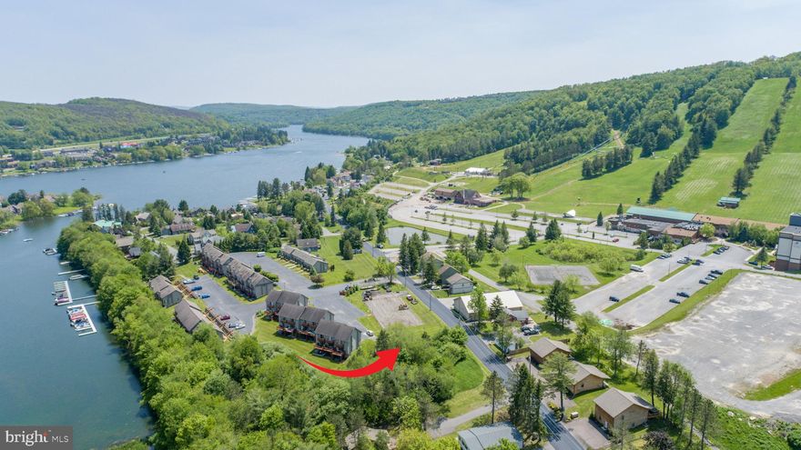 Located just moments from the entrance to Wisp Ski Resort, this 0.11-acre parcel on Marsh Hill Road offers an ideal opportunity to build your dream mountain getaway or high-performing vacation rental. Enjoy scenic views of the ski slopes and surrounding mountains, all while benefiting from the convenience of county-maintained road frontage, access to public water and sewer, and no HOA restrictions. With its unbeatable location and year-round appeal, this lot is perfectly positioned for four-season living or investment potential in the heart of Deep Creek Lake’s most sought-after area.