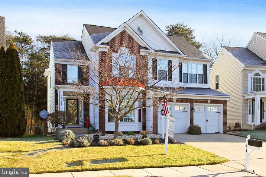 This home style is RARELY on the market in this Independence Community. It just won't last long! Stunning home with lots of special features. 4 Bedrooms, 3.5 bathrooms, and a bonus room in the finished basement. Use this room however you would like-office, craft room, work-out room,  security room... Sellers have loved this home (and community) and have taken extra good care of the home and kept up with it. Recent activity on the home includes: new roof 2020, new insulated garage doors 2020, new garage door openers 2020, new dishwasher 2020, HVAC 2020, new carpet 2020, interior painting 2020, exterior painting 2019, 3 French doors 2019 and others! This home is beautifully designed with kitchen bump-outs, bay window, curved staircase, breakfast room, built-in wall-bed/murphy bed, extra storage in the basement, beautifully designed landscaping and hardscaping in front and back-yard with outdoor lighting, patio and patio walls, main level office and so much more. Independence is a planned housing community that was developed in 2002. The community has a private pool, pool-house, baby pool, 2 playgrounds, basketball court, walking paths, grassy common areas, and two gazebos! Friendly neighborhood and pet loving community!  It is located just off the Prince William Parkway, easy access to I66, major highways, and close to Jiffy Lube Live, Hylton Performing Arts, George Mason University, Manassas Airport, VRE and shopping and dining! So much to LOVE!