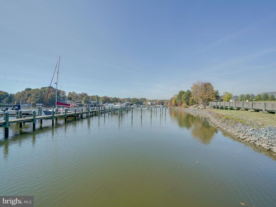 OPEN HOUSE SUNDAY 3/8 12-2PM. Discover this exceptional, beautifully updated 2-bedroom, 2-bath, main level condo offering 1,541 sq. ft. of open, light-filled living in Hopewell Pointe. This water-privileged community with the bonus of your very own boat slip (#14) that will accommodate vessels up to 40 ft. This outstanding residence features new HVAC and hot water heater (2025), LPV flooring throughout, and elegant lighting and finishes. Step into an inviting layout with an open living room anchored by a gas fireplace, spacious eat-in kitchen that boasts quartz countertops, stainless steel appliances, a gas stovetop, pantry closet, and a bright breakfast room with access to your private patio — adding private entry and exit. A versatile dining room or office space provides flexible space to suit your lifestyle. The primary suite is a true retreat, complete with a walk-in closet, sitting area, and an en-suite bathroom featuring a double vanity, tub shower and bidet. The guest bedroom offers generous space and natural light, complemented by a beautifully updated second full bath with a tub shower. Enjoy water oriented lifestyle off Hopkins Creek with direct and quick access to Middle River & the Chesapeake Bay. Hopewell Pointe provides exceptional community amenities including private piers, a seasonal outdoor pool, lighted walking/biking trails, and plenty of parking for visitors. Perfectly positioned close to marinas, restaurants, shops, and with easy access to I-95, I-695, 40, 83 & more, this home offers a rare combination of comfort, style, and a vibrant water-oriented lifestyle. Call to schedule your appointment today!