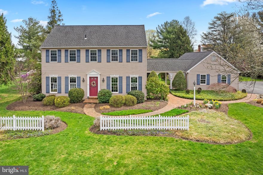 Nestled in the desirable community of River Knoll is this wonderfully maintained and thoughtfully appointed salt box colonial. Live your dream of homeownership in desirable Upper Makefield Twp with this exceptional home that exudes warmth and charm all beginning with the fantastic curb appeal. Enjoy beautiful gardens, manicured lawn and a storybook white picket fence as you approach the main entry. Once inside, this center hall colonial will not disappoint. Rich hardwoods greet you and span into both the formal living room and the formal dining room allowing them to be fantastic spaces to entertain. The Charles Weiler kitchen is a delight and emphasizes the Bucks County aesthetic with gorgeous soapstone counters, mercer tile backsplash, and farmhouse style custom cabinetry. The sunlit breakfast area is a pleasant space to enjoy a meal, a morning cup of coffee or admire the beauty of nature as the songbirds delight in the pollinator garden. The family room expands across the back of the home and showcases a cozy gas fireplace and wall of windows with a sliding Pella door out to the brick patio. The upper-level hosts 3 bedrooms including the primary suite with a large walk-in closet and newly updated bath featuring a frameless shower and crisp, neutral palette. The hall bath is equally beautiful and recently renovated making it a pleasant space for family or guests. The lower level is partially finished and offers fantastic storage and unlimited potential for all your needs including a gym, play space and more! Additional amenities include an amazing yard great for outdoor fun, invisible pet fence, Newer carpet, 3 car garage with remarkable storage and separate staircase leading to an expansive unfinished space, Newer Andersen windows, ceiling fans in all bedrooms, and irrigation system in the lawn and garden. Situated in historic Washington Crossing, this home offers easy access to the scenic Delaware River, Washington Crossing State Park, and nearby towns like Newtown, New Hope, and Yardley for shopping and dining. Located within the highly regarded Council Rock School District and convenient for commuting to Princeton, Philadelphia, or New York City. Meticulously maintained and ready to be enjoyed!