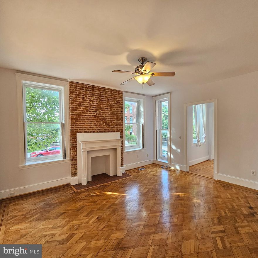** 2BR/2BA Apartment with Deck Overlooking Park! ** Live in the heart of beautiful Baltimore City's Bolton Hill in this spacious 2-bedroom, 2-bath apartment that blends historic charm with modern style. Highlights include hardwood floors, 11' ceilings, tall 9' windows, central A/C, and decorative fireplace mantels. The bright eat-in kitchen features granite countertops and stainless steel appliances. Both bathrooms are updated with stone accents and stylish fixtures. Enjoy a private laundry room with washer/dryer and a rear deck with a peaceful park view. Located on a tree-lined block with gardens and a nearby fountain. No smoking. Landlord requires a minimum credit score of 700 for application approval. Schedule your tour today — this Bolton Hill gem won’t last!